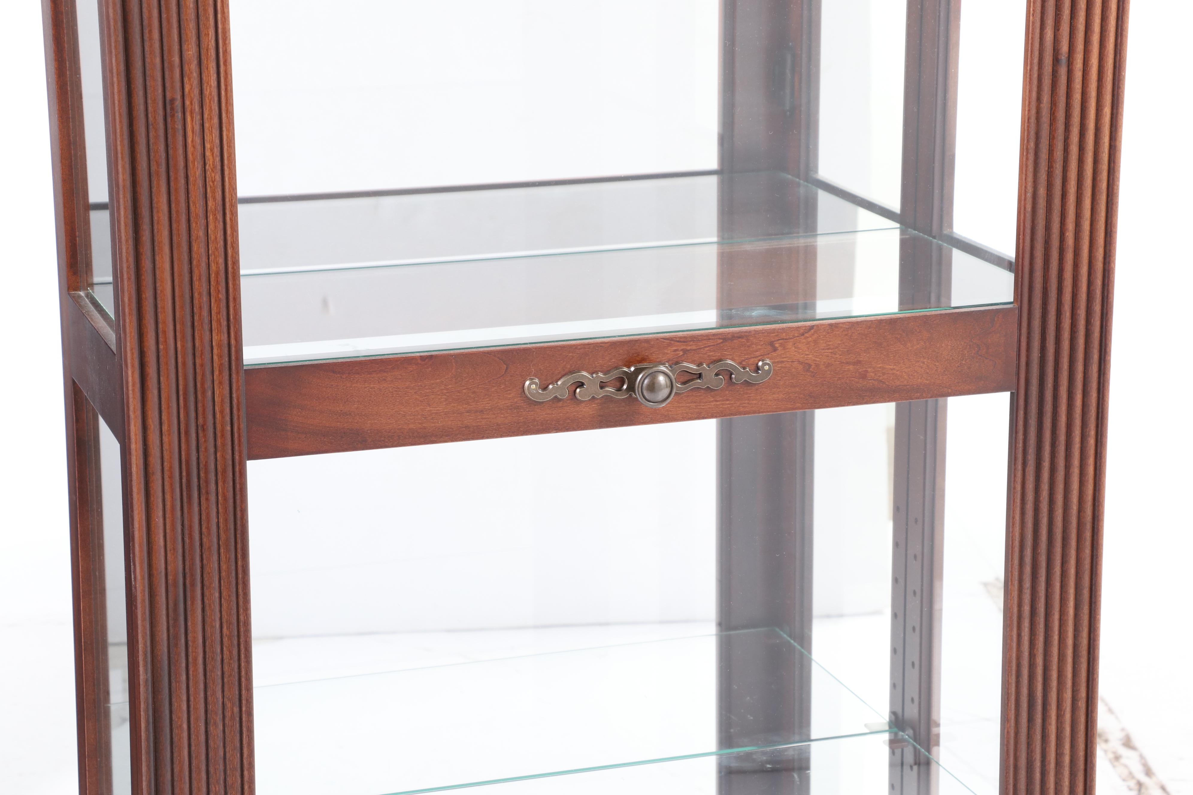 Howard Miller Cherrywood-Stained Mirror-Back Display Cabinet