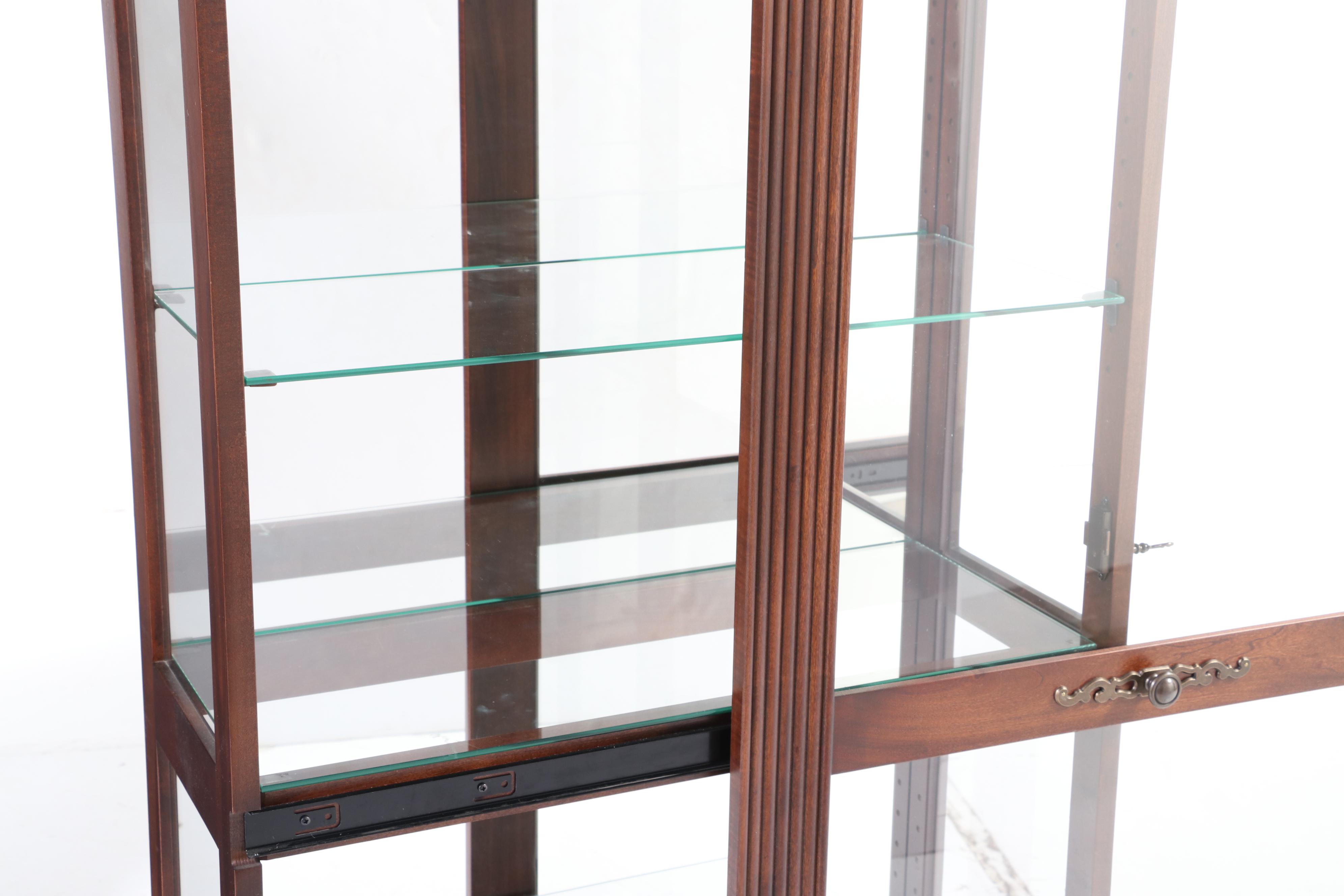 Howard Miller Cherrywood-Stained Mirror-Back Display Cabinet