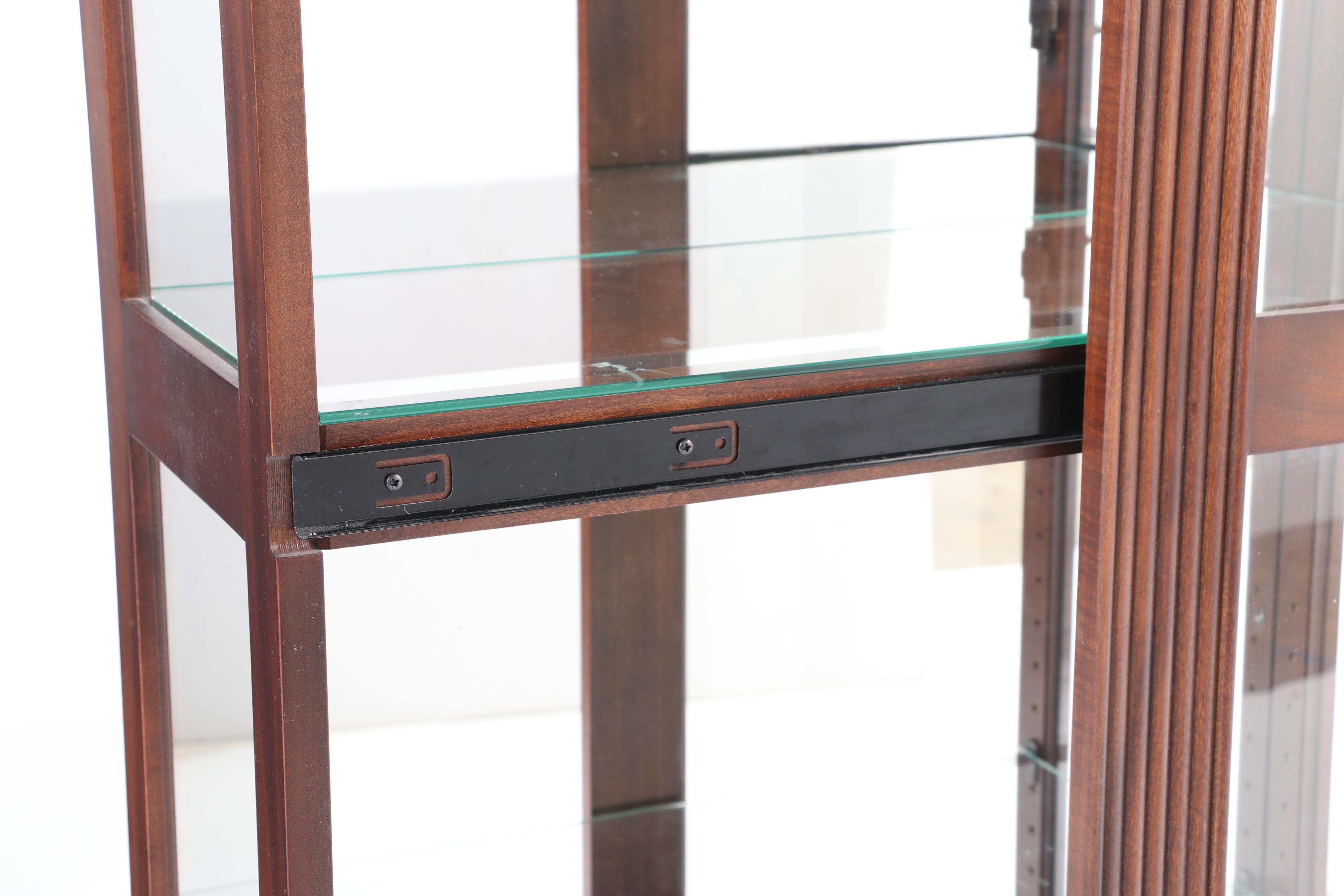 Howard Miller Cherrywood-Stained Mirror-Back Display Cabinet