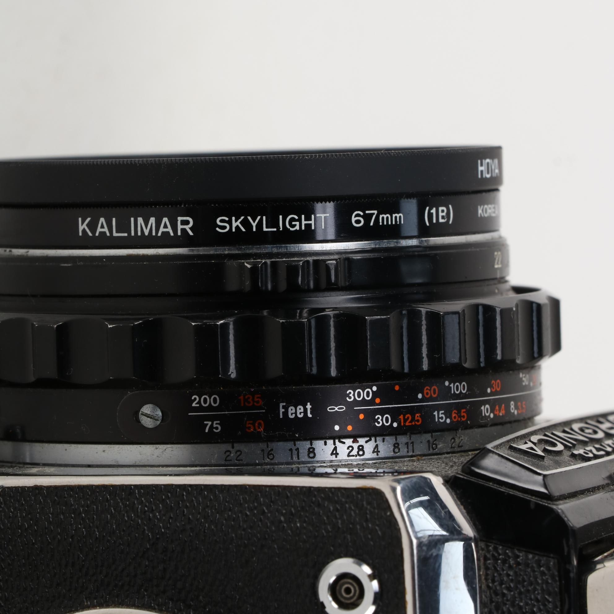 Zenza Bronica SLR Camera with Strap, Grip, Lens and Extra Film Back