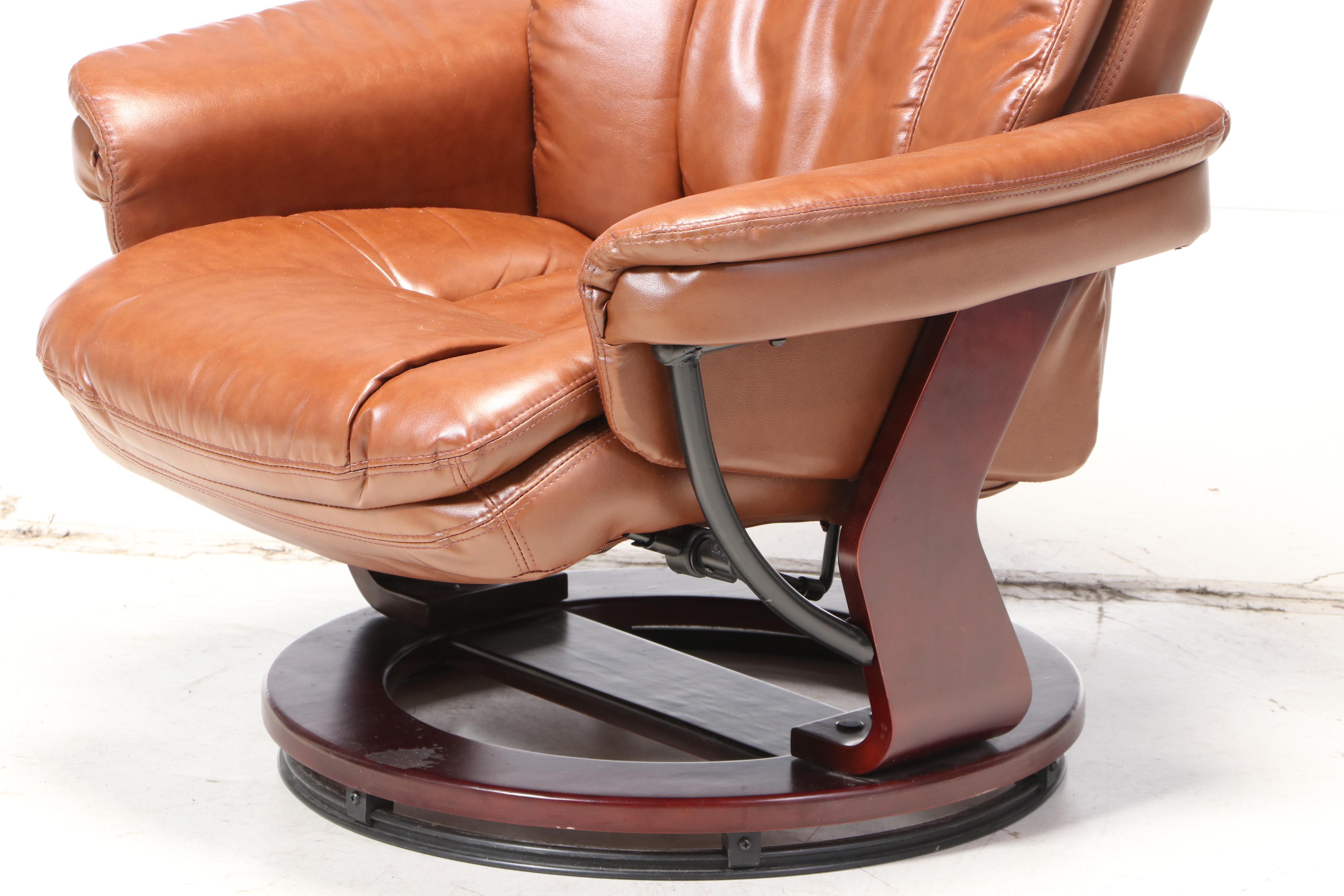 Belnick Inc. Faux-Leather Swivel Recliner and Ottoman