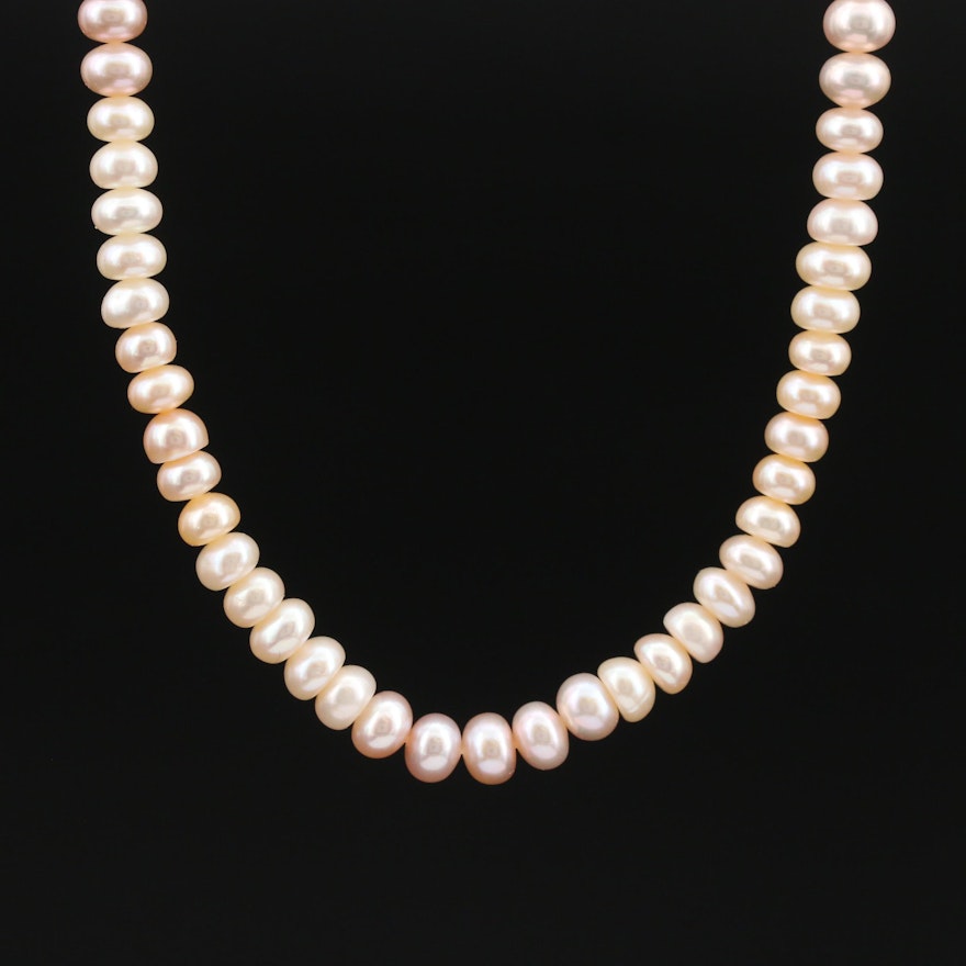 Strand of Button Pearls with 14K Clasp