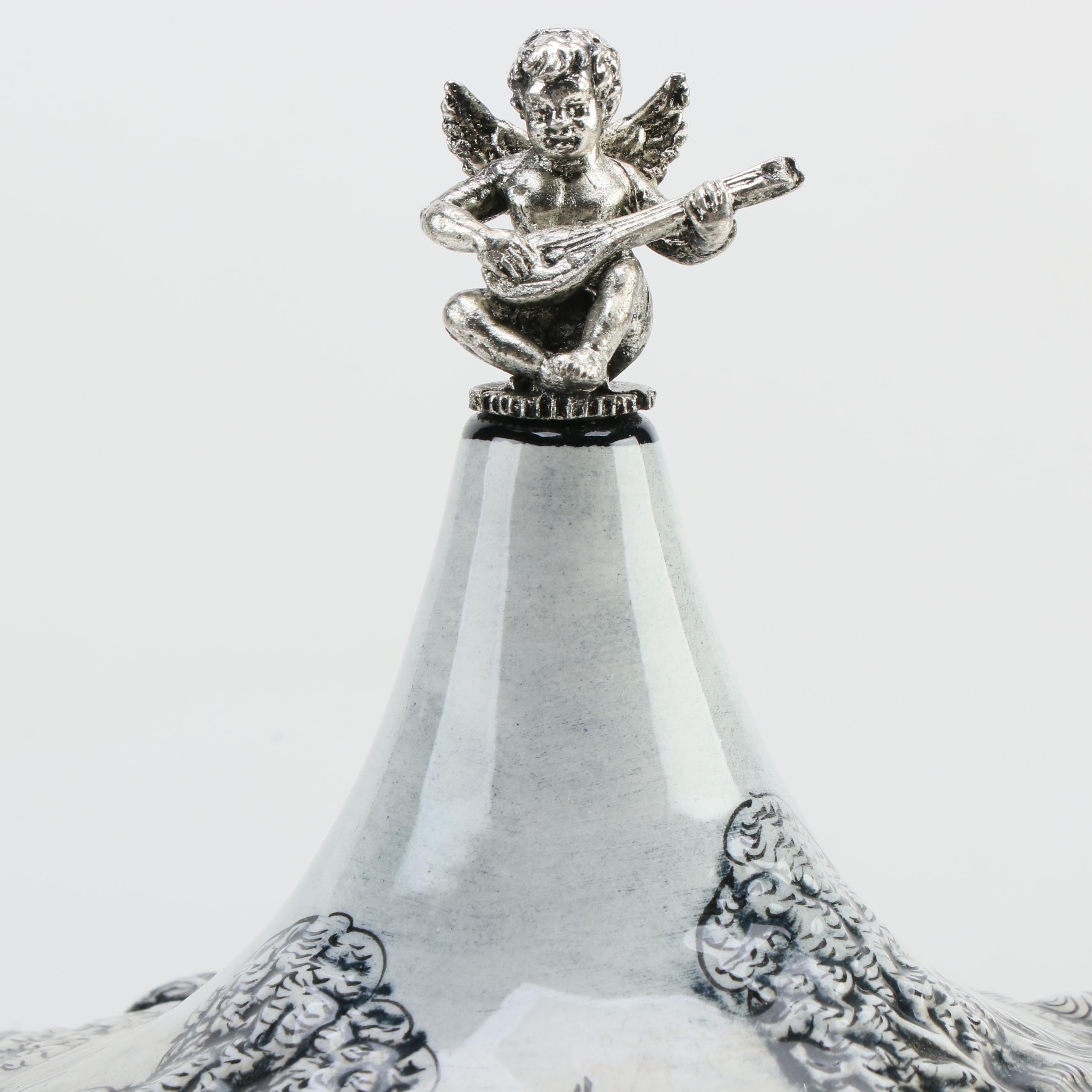 Reuge Swiss Ceramic Musical Lipstick or Cigarette Carousel, Late 20th Century