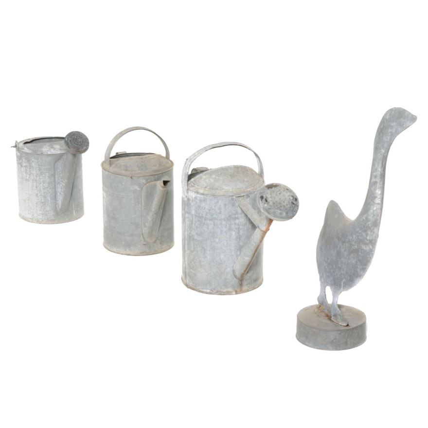 Three Aluminum Watering Cans and Goose Figure, Mid-20th Century