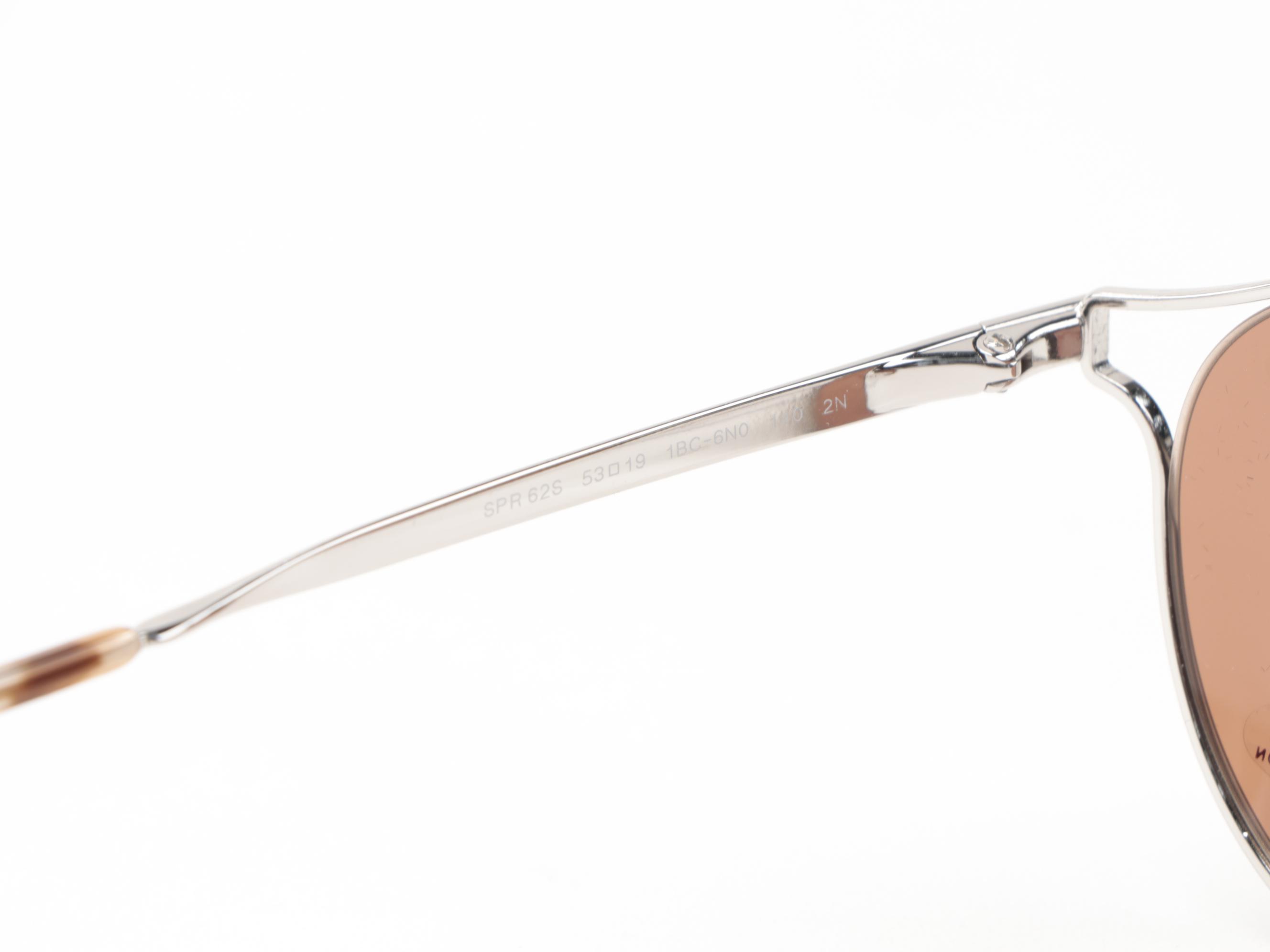 Prada Rounded Modified Cat Eye Sunglasses with Case