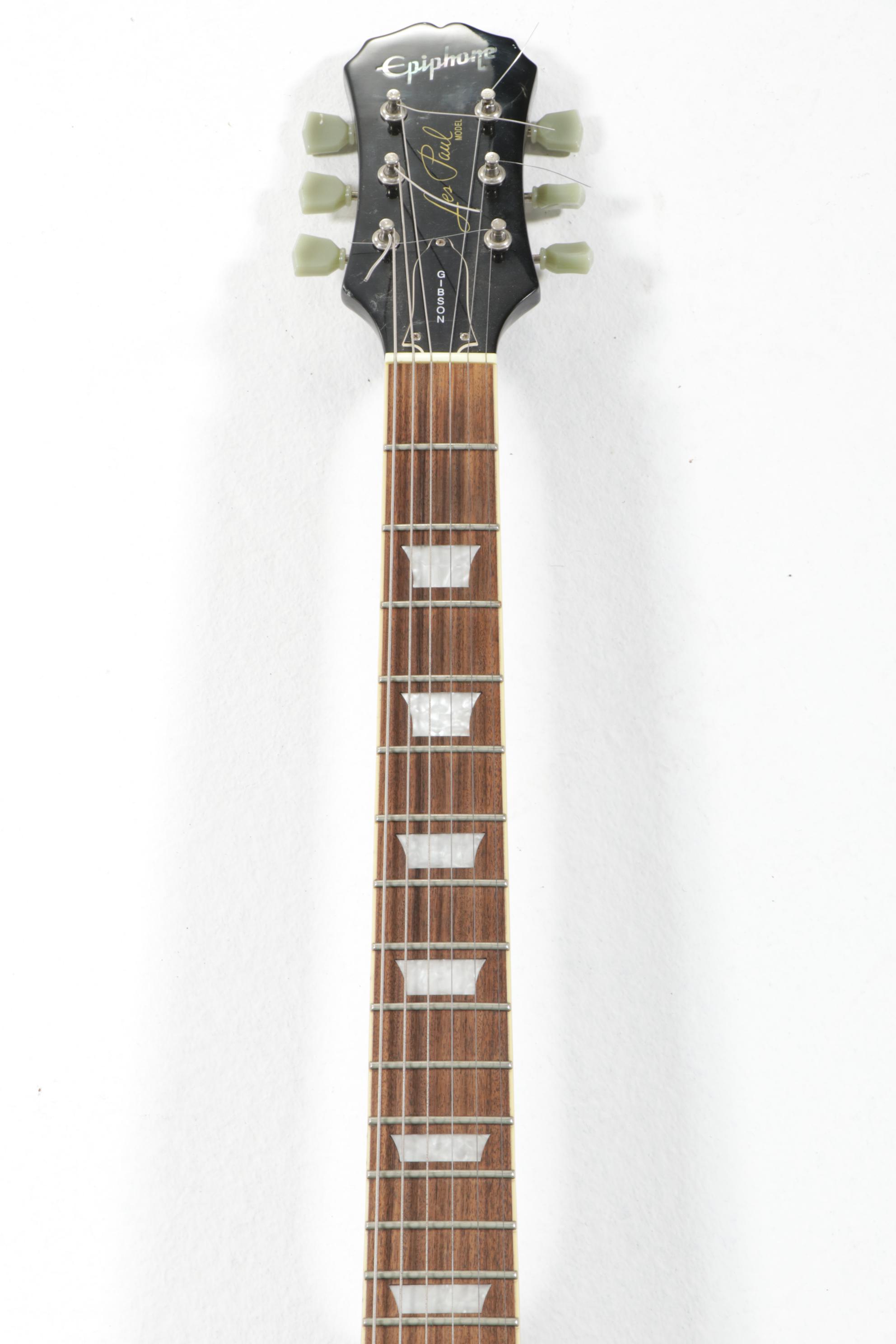 Epiphone Les Paul Electric Guitar and Line 6 Amp, 21st Century