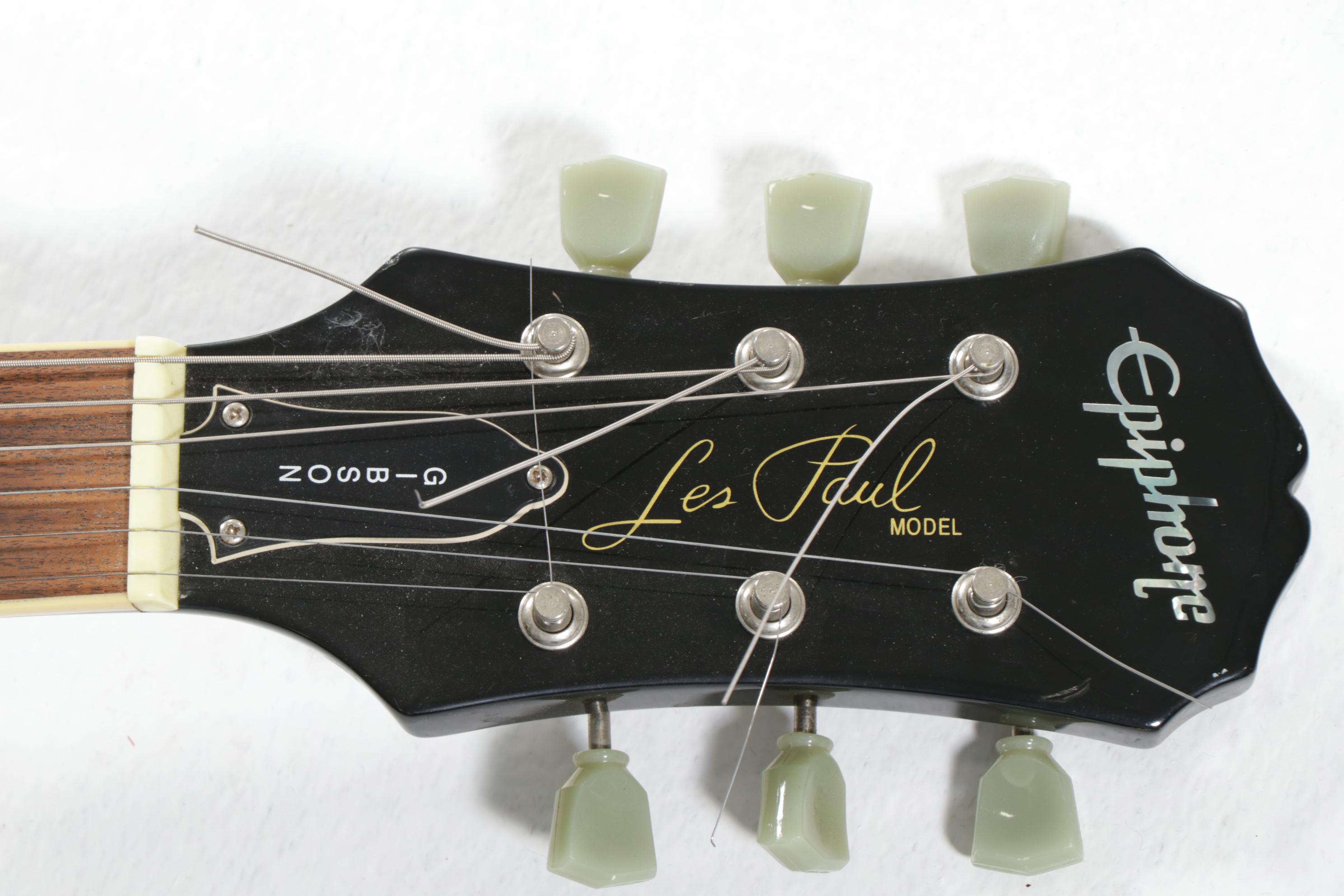 Epiphone Les Paul Electric Guitar and Line 6 Amp, 21st Century