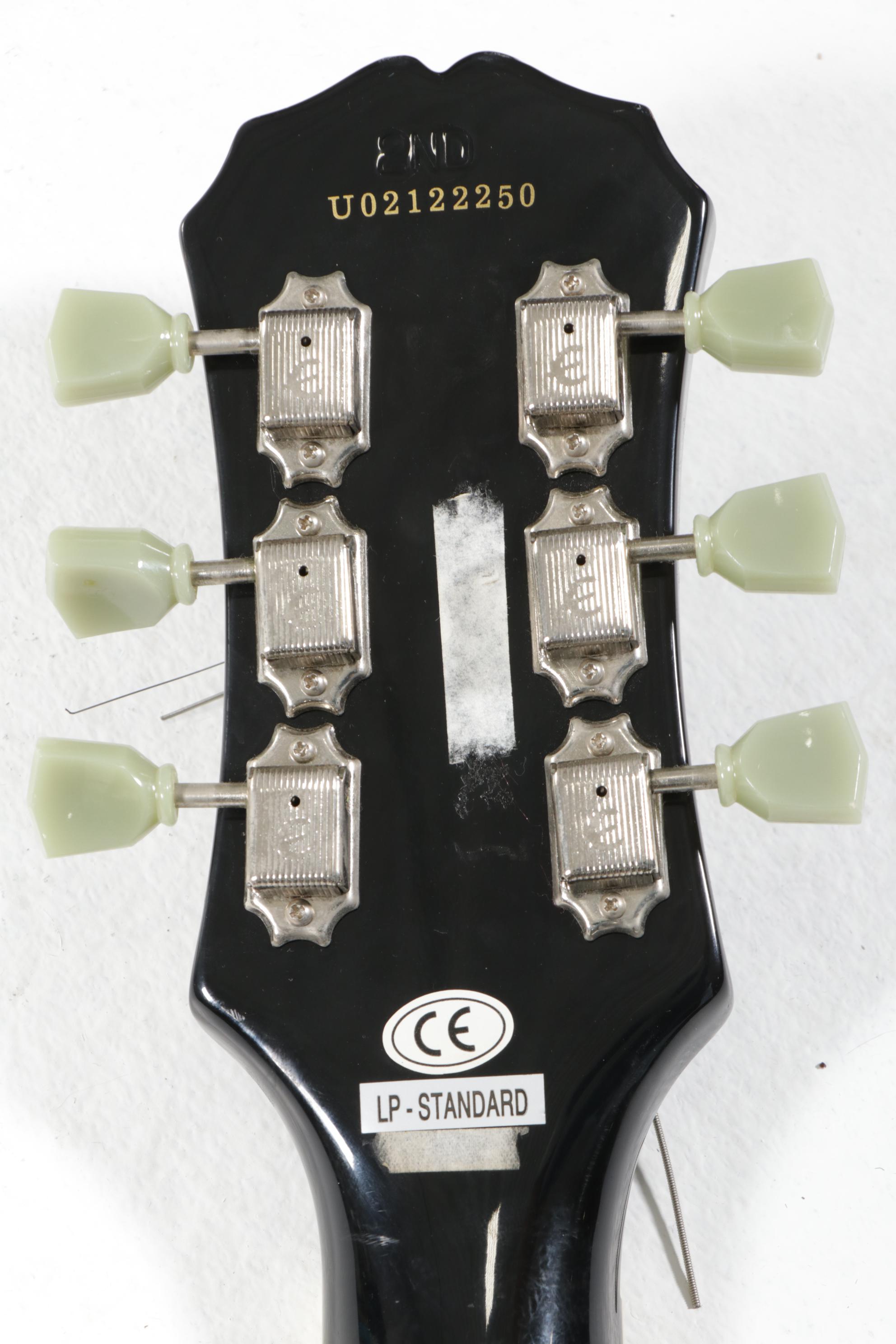 Epiphone Les Paul Electric Guitar and Line 6 Amp, 21st Century