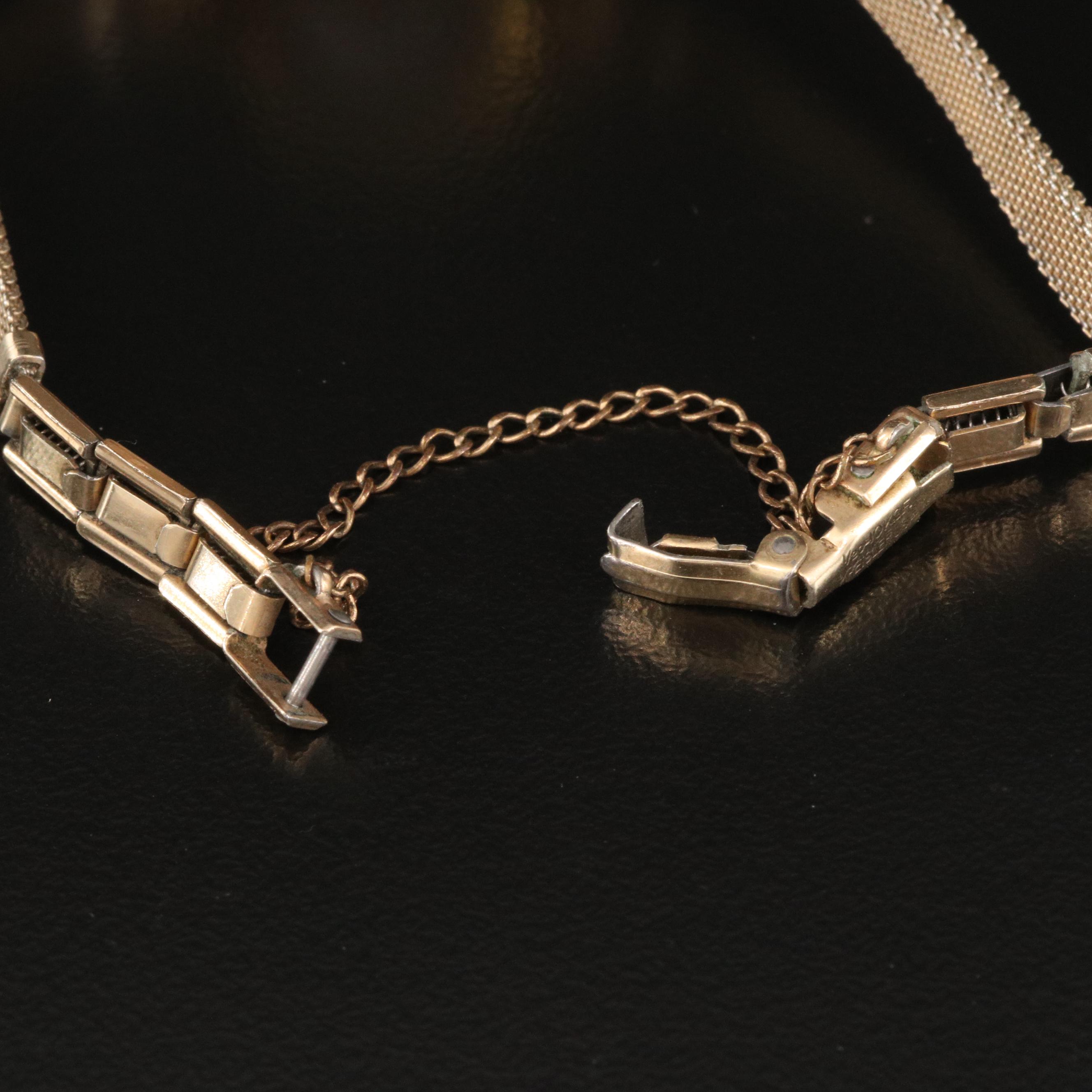 18K Omega Watch with Fluted Bezel and Flared Lugs