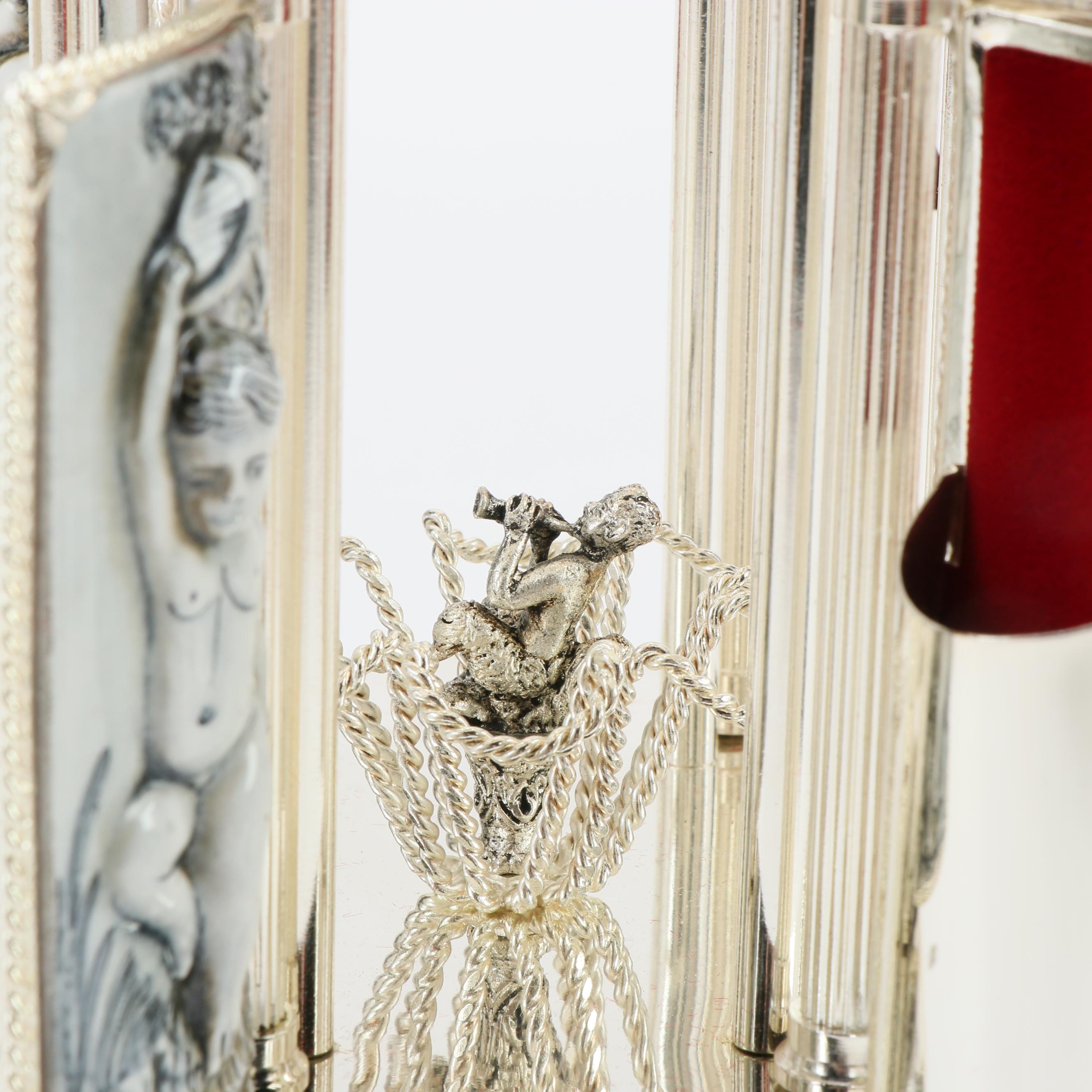 Reuge Swiss Ceramic Musical Lipstick or Cigarette Carousel, Late 20th Century