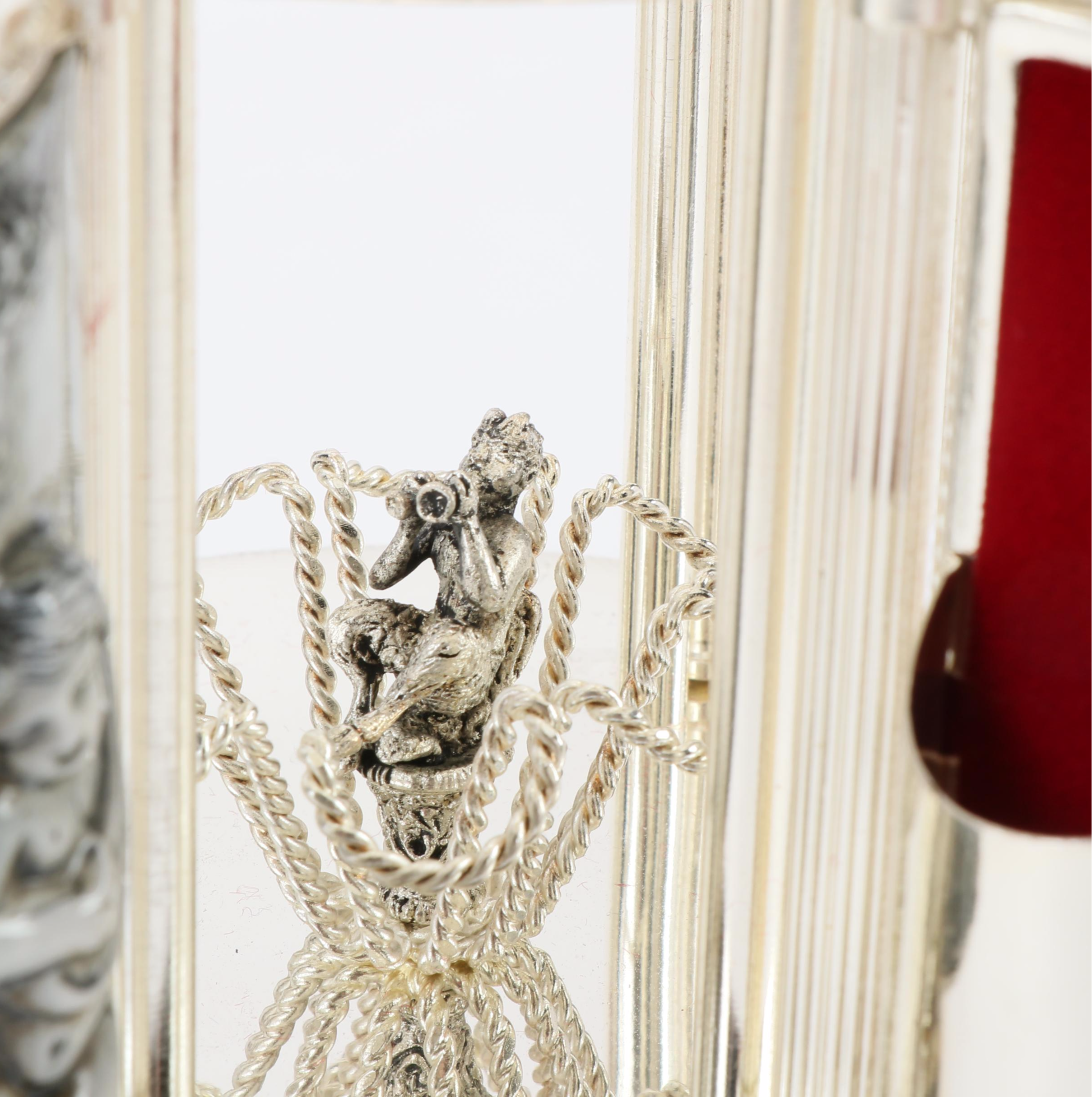 Reuge Swiss Ceramic Musical Lipstick or Cigarette Carousel, Late 20th Century