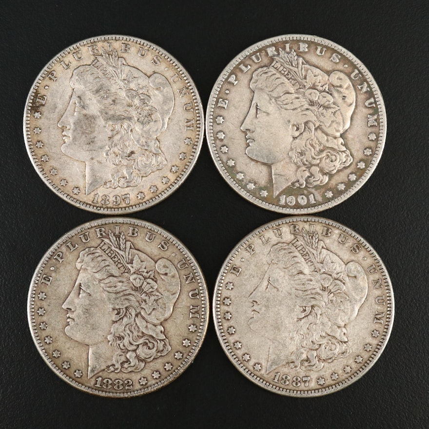 Four Morgan Silver Dollars