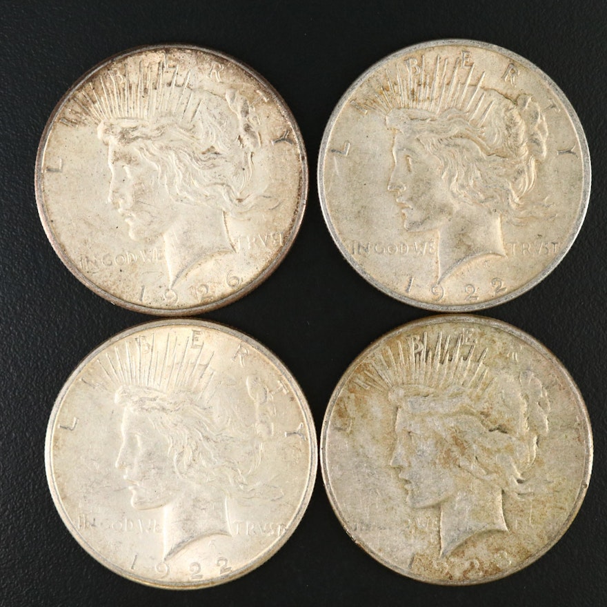 Four Peace Silver Dollars
