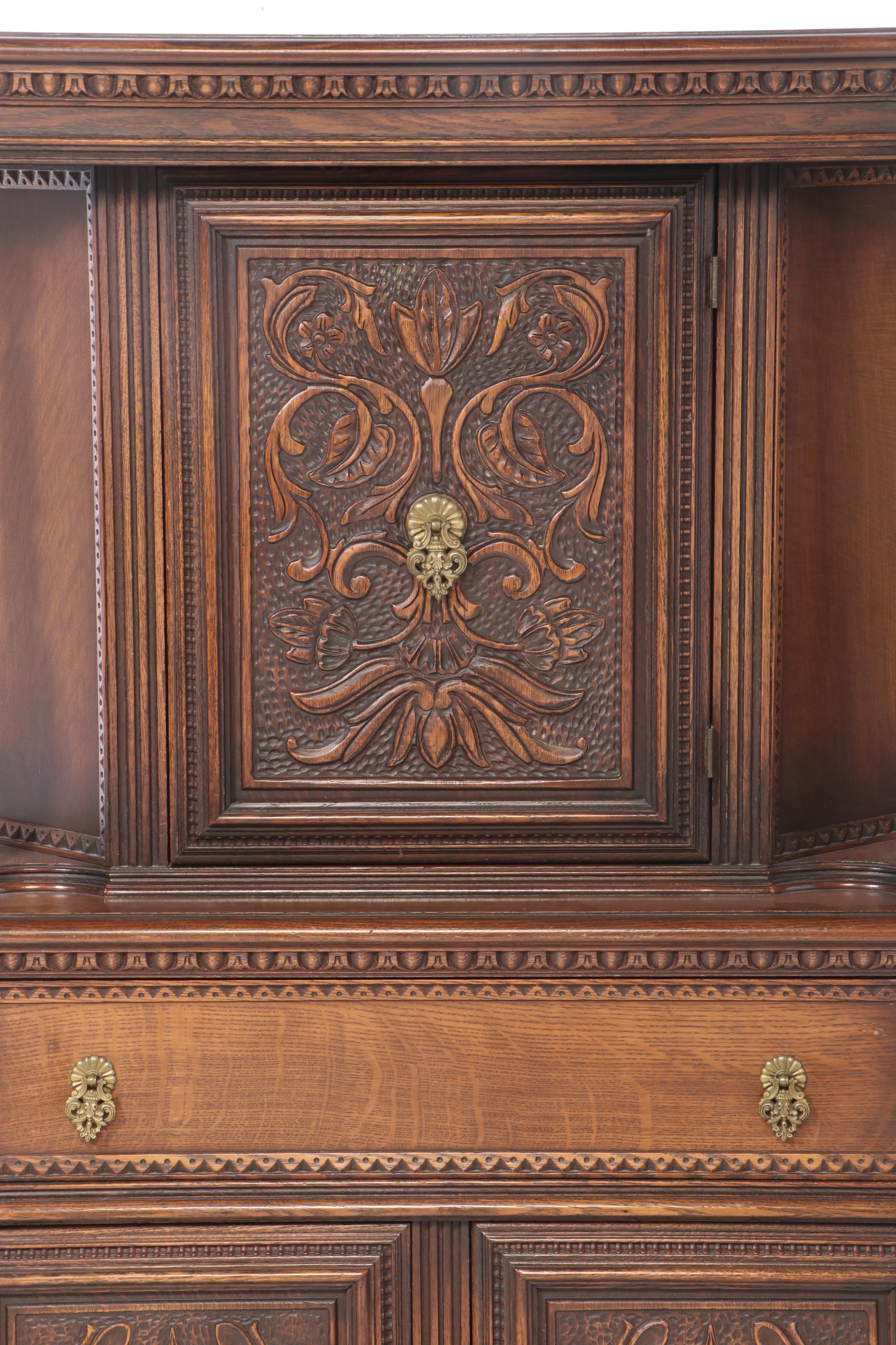 Jacobean Style Relief-Carved Oak China Cupboard, Early to Mid 20th Century