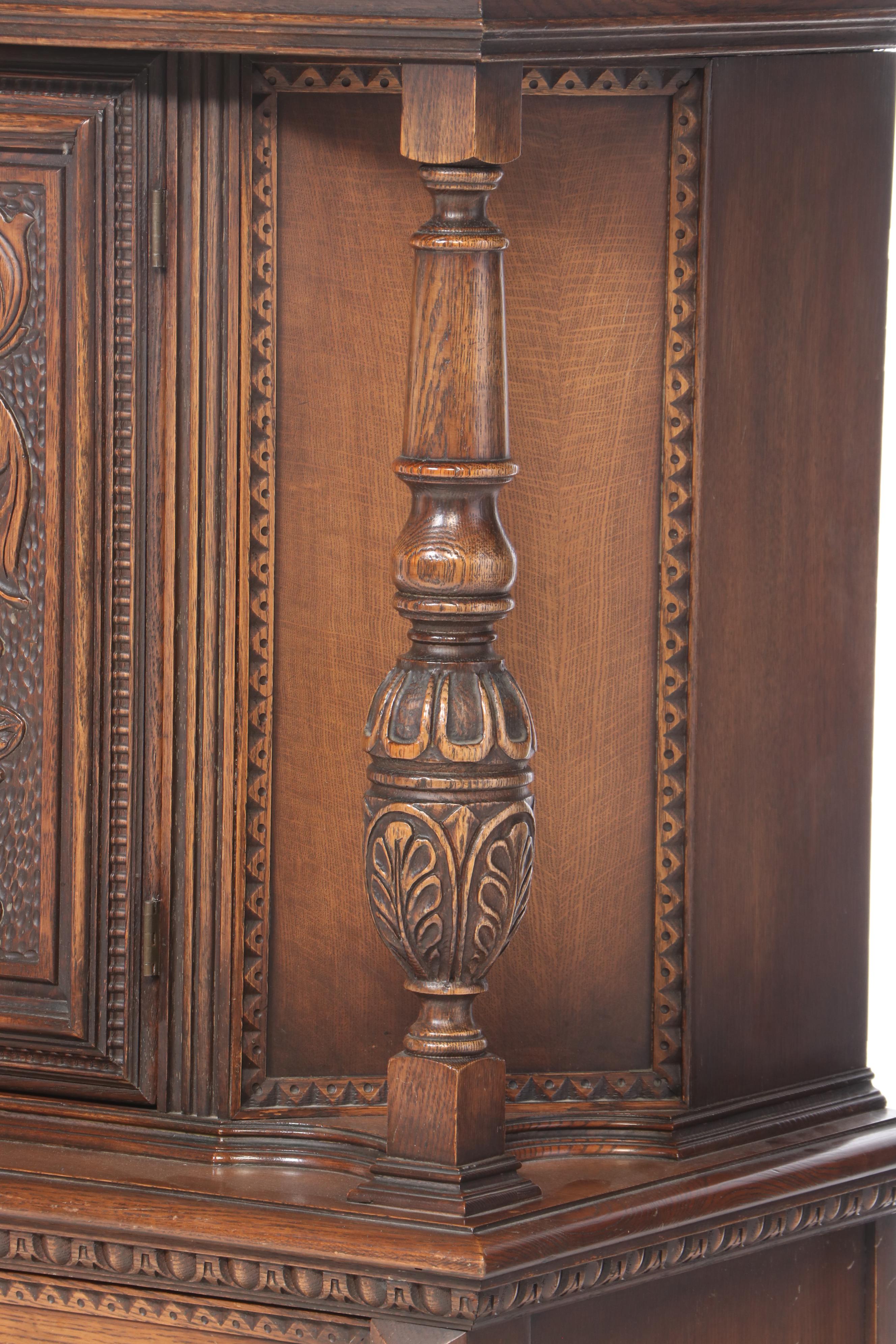 Jacobean Style Relief-Carved Oak China Cupboard, Early to Mid 20th Century