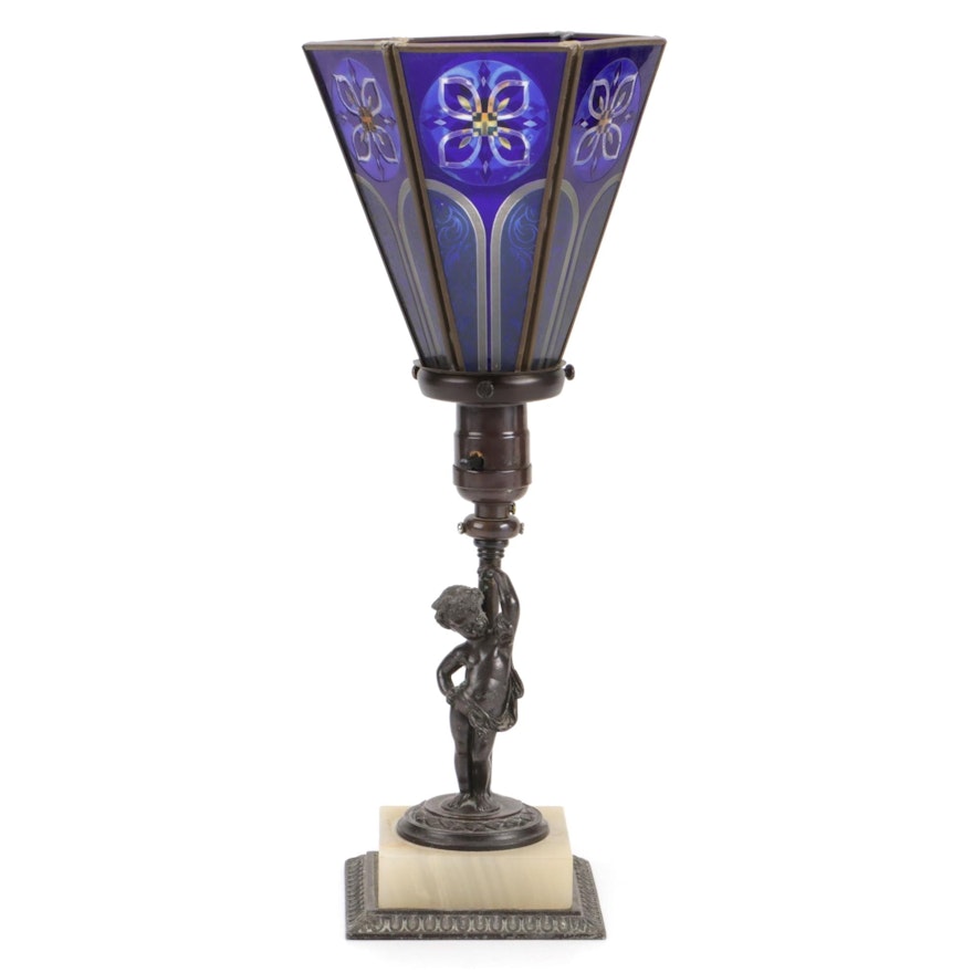 Pairpoint Onyx and Metal Figural Cherub Torchiere Lamp with Blue Glass Shade