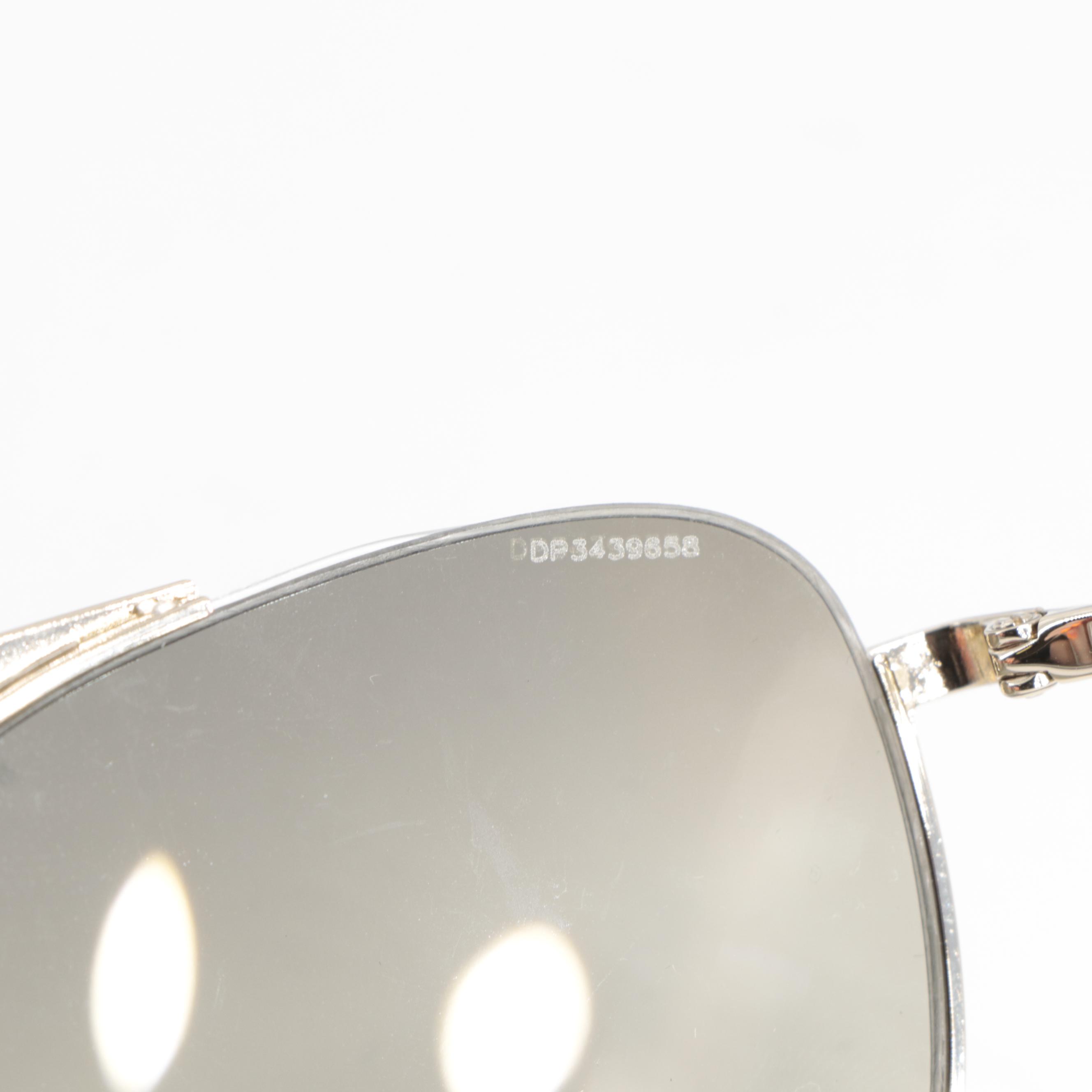Prada SPR50U Metal Aviator Sunglasses in Gold Tone Finish