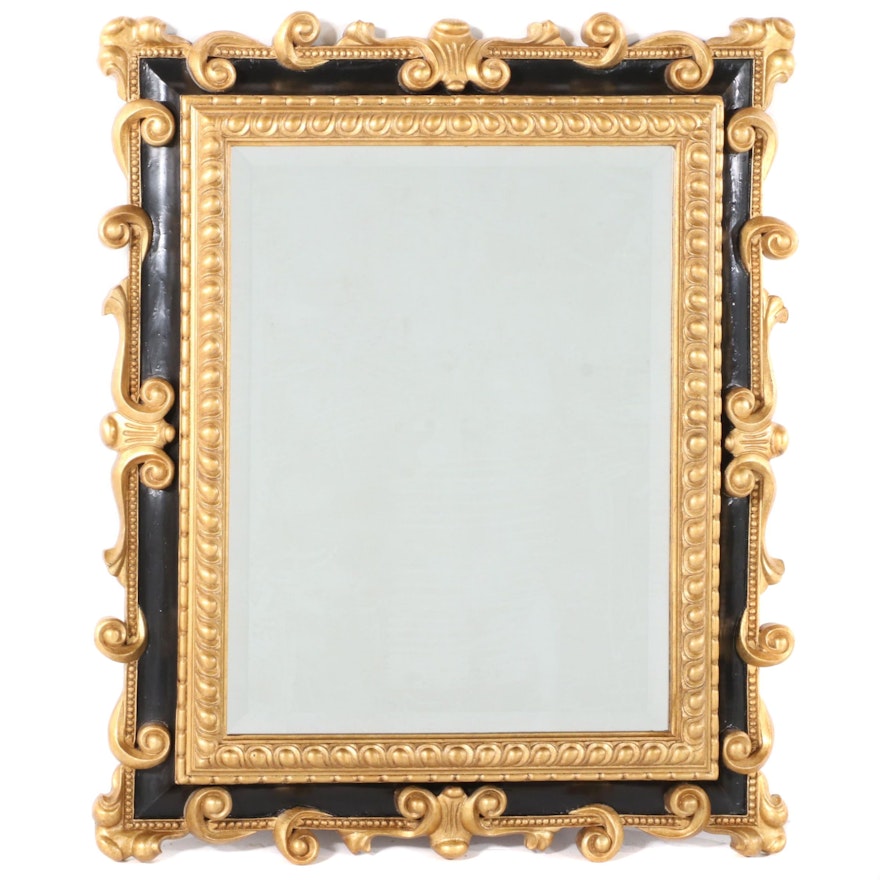 Baroque Style Ebonized and Parcel-Gilt Composite Mirror