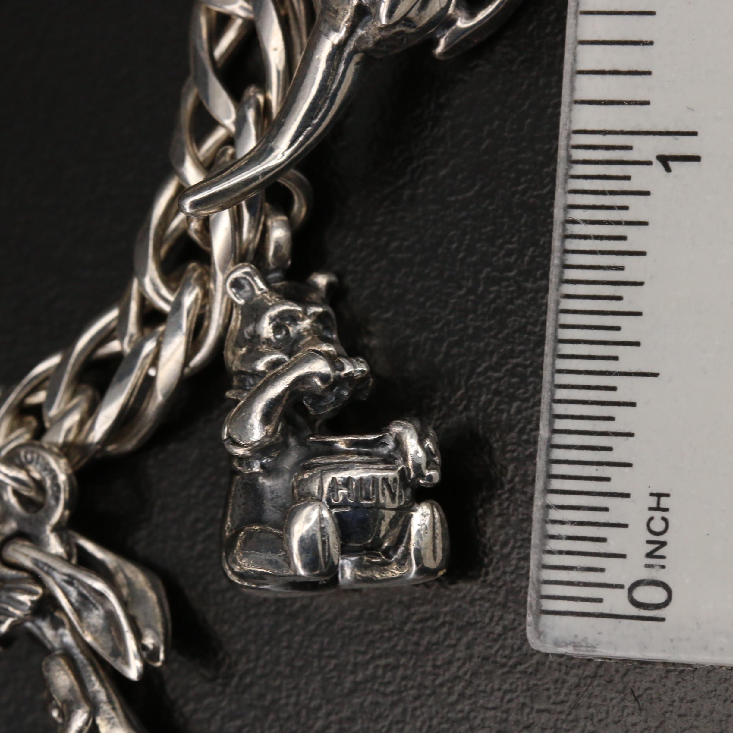 Disney "Winnie the Pooh" Sterling Charm Bracelet with Articulated Charms