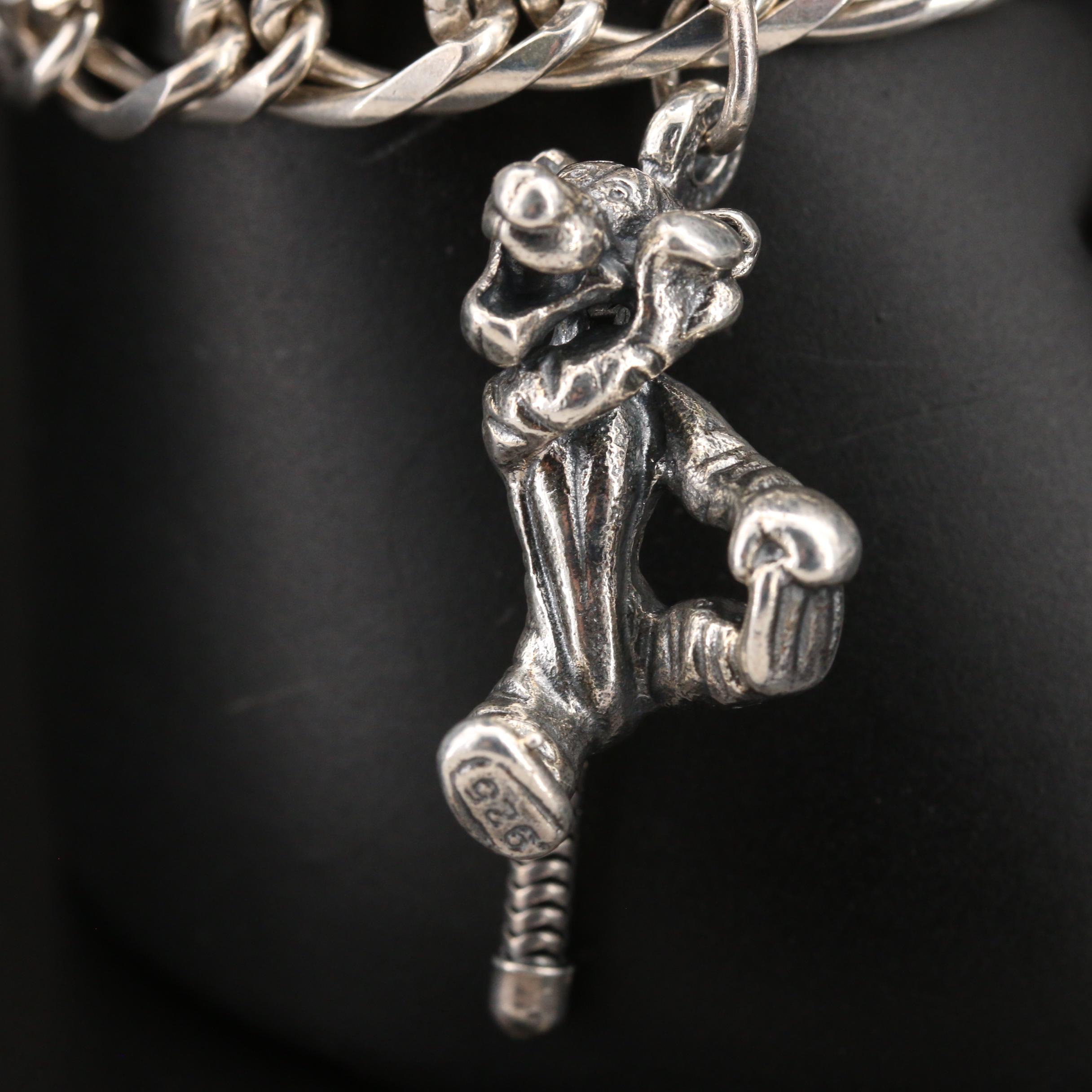 Disney "Winnie the Pooh" Sterling Charm Bracelet with Articulated Charms