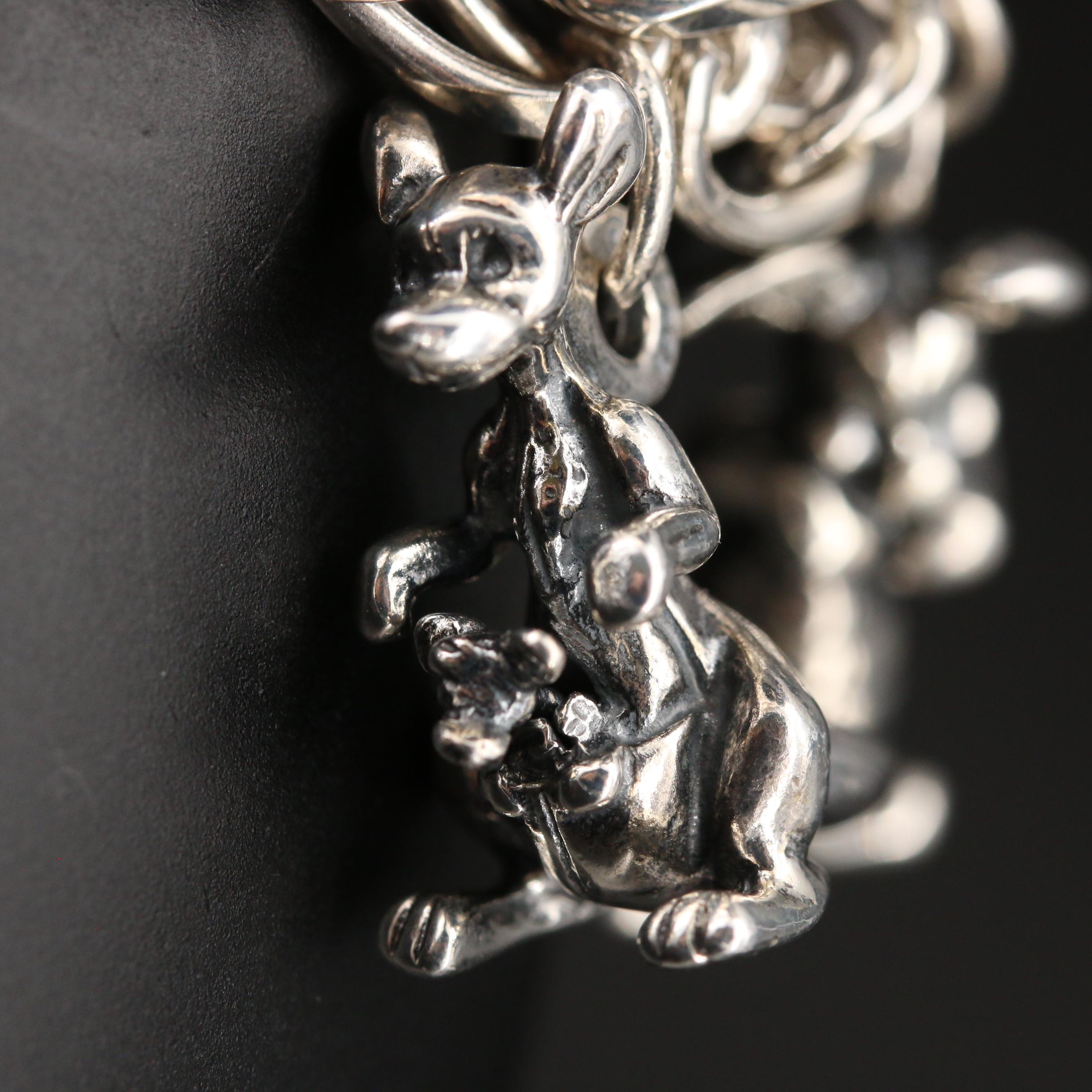Disney "Winnie the Pooh" Sterling Charm Bracelet with Articulated Charms