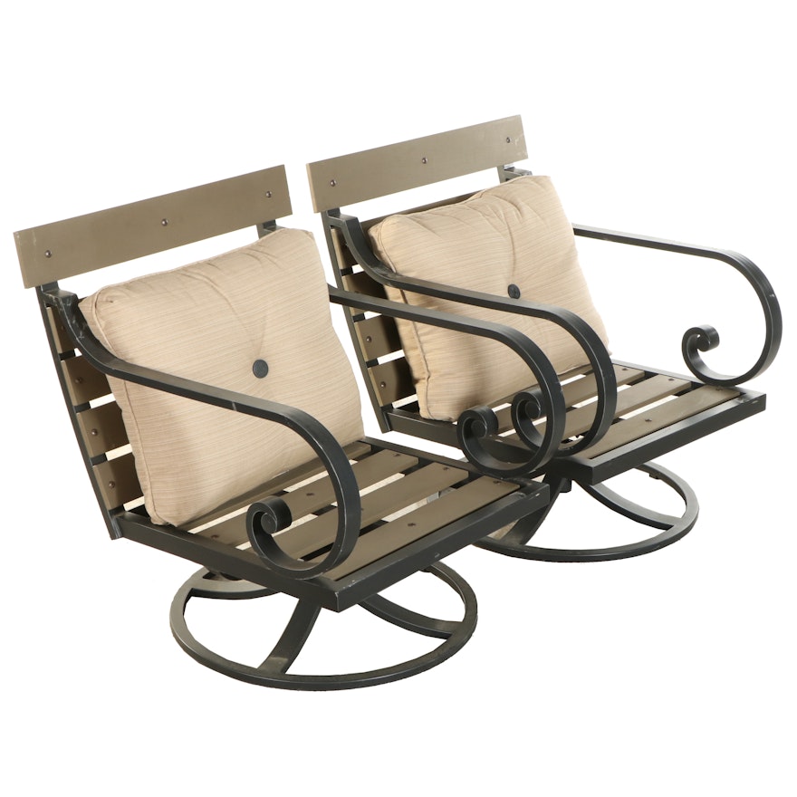 Pair of Metal and Wood Look Resin Swivel Patio Chairs