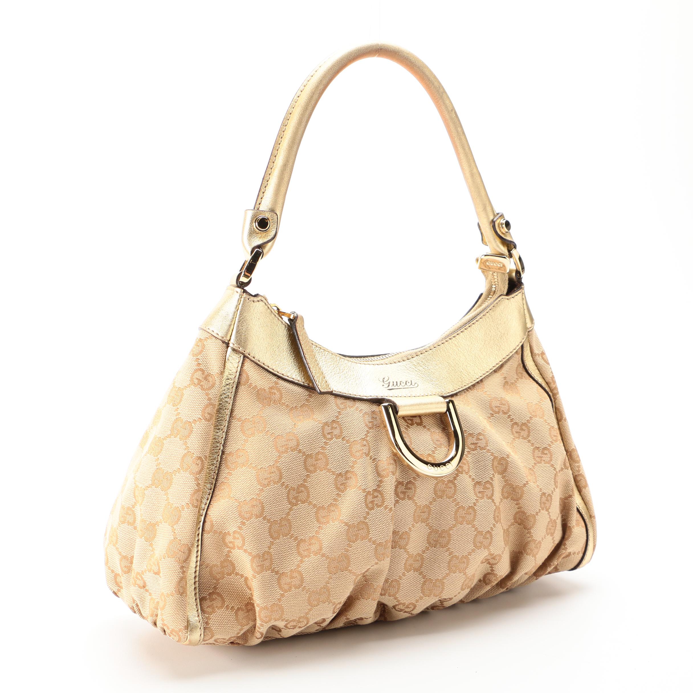 Gucci Abbey D-Ring Hobo Bag in GG Canvas and Gold Metallic Leather