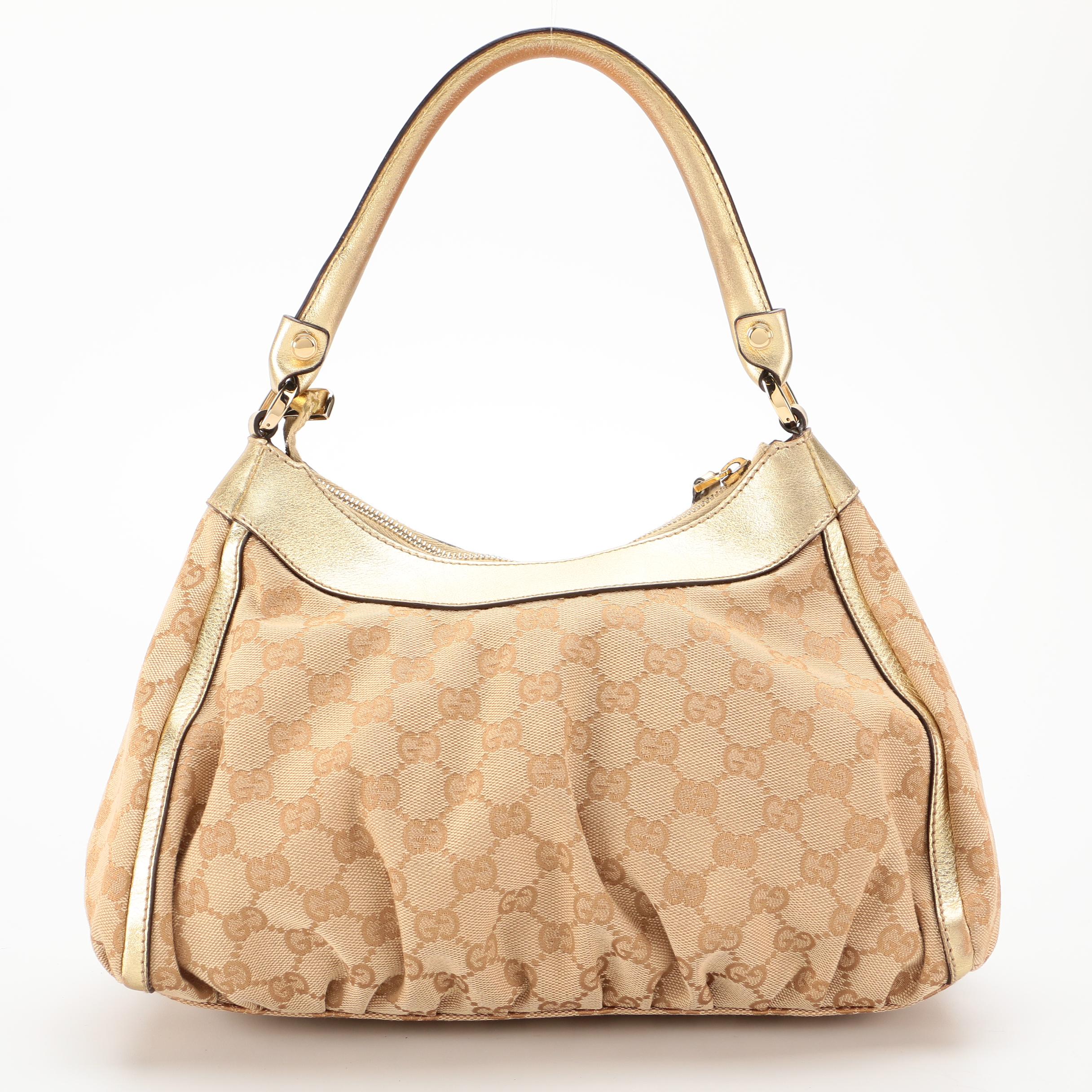 Gucci Abbey D-Ring Hobo Bag in GG Canvas and Gold Metallic Leather