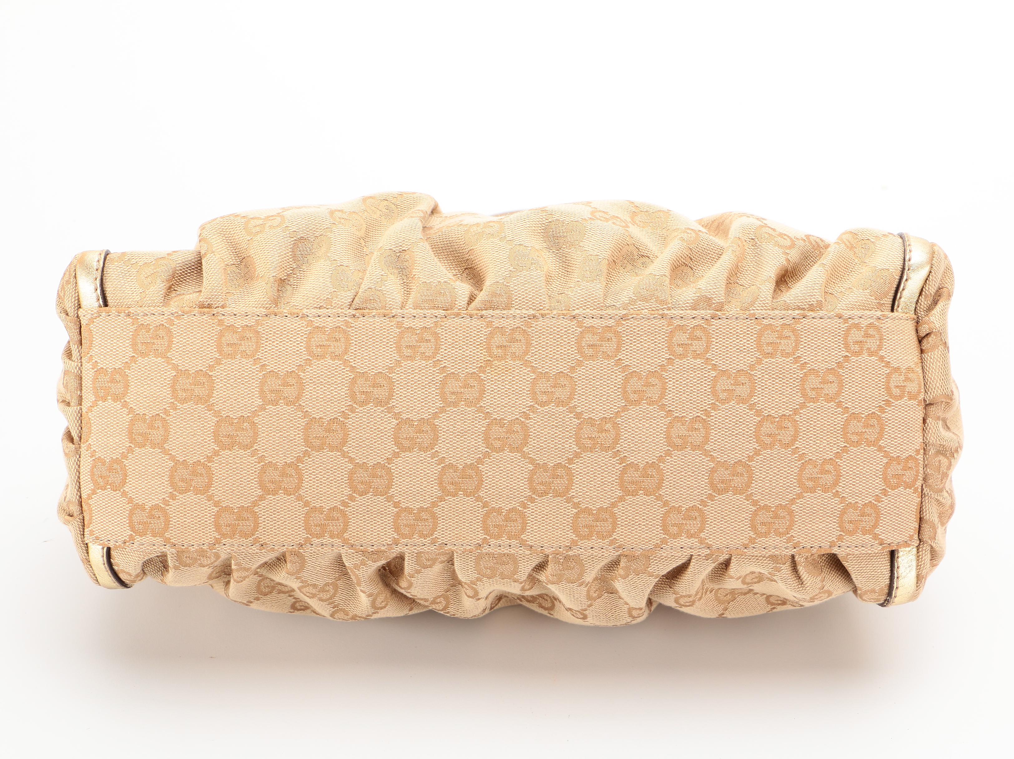 Gucci Abbey D-Ring Hobo Bag in GG Canvas and Gold Metallic Leather