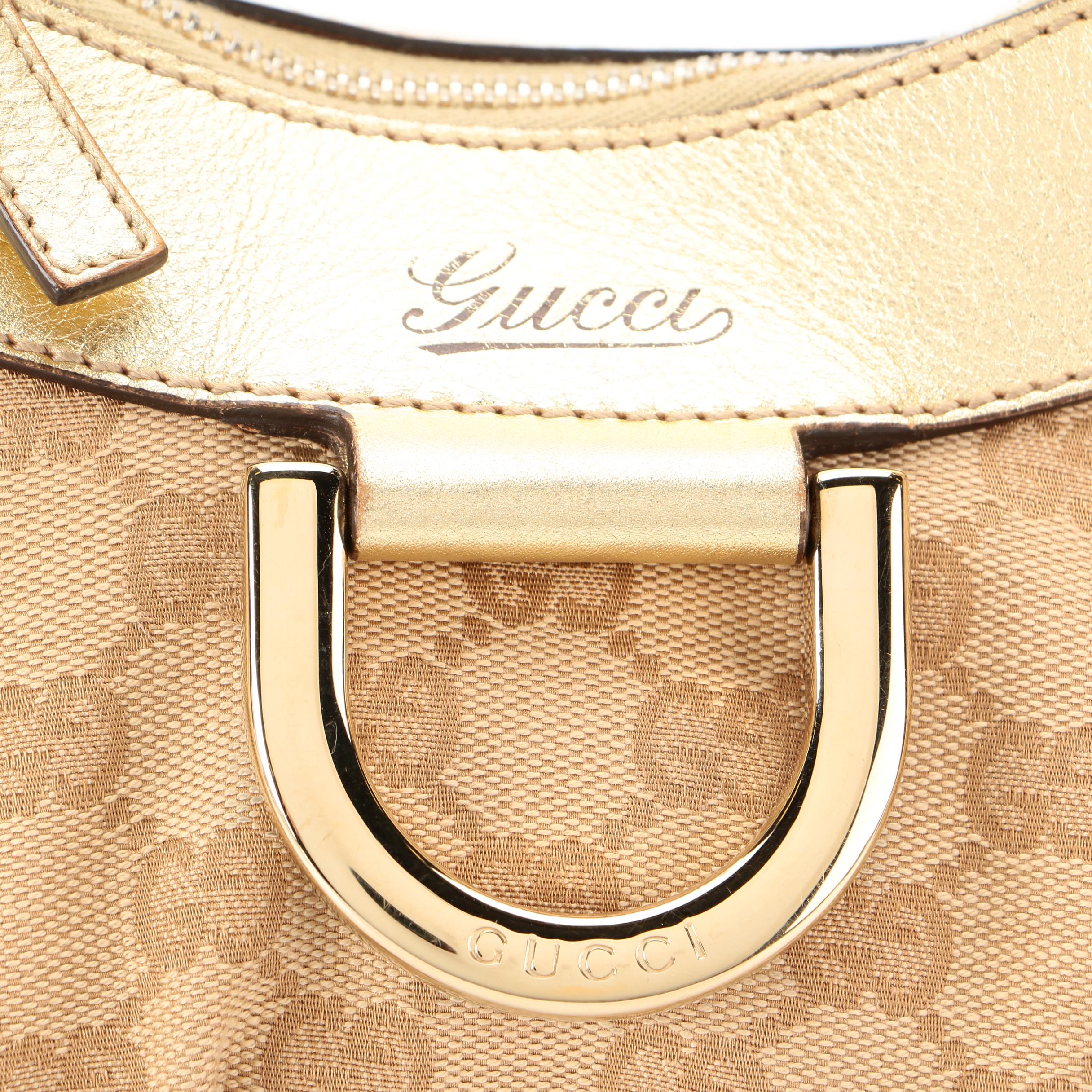 Gucci Abbey D-Ring Hobo Bag in GG Canvas and Gold Metallic Leather