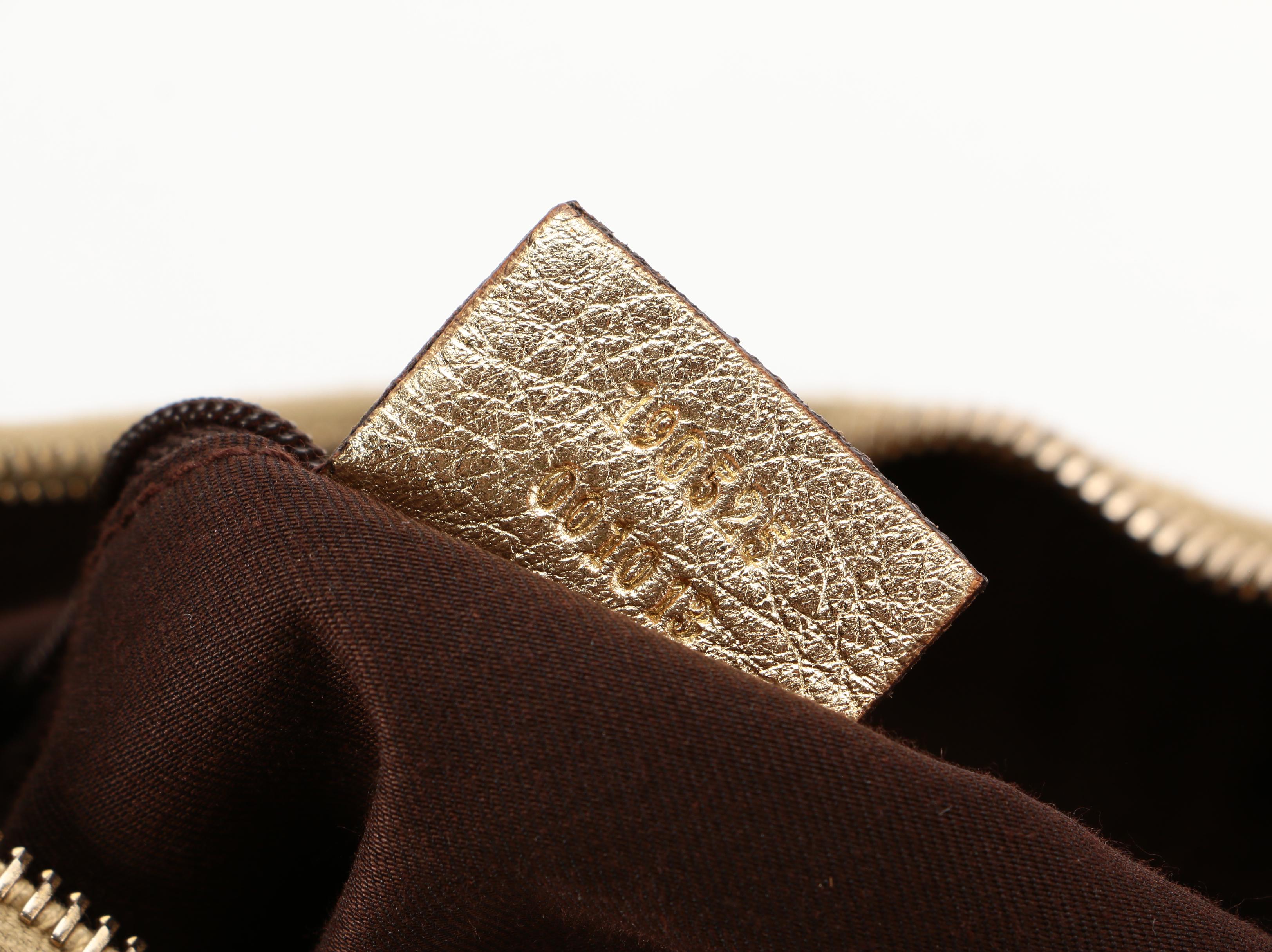 Gucci Abbey D-Ring Hobo Bag in GG Canvas and Gold Metallic Leather