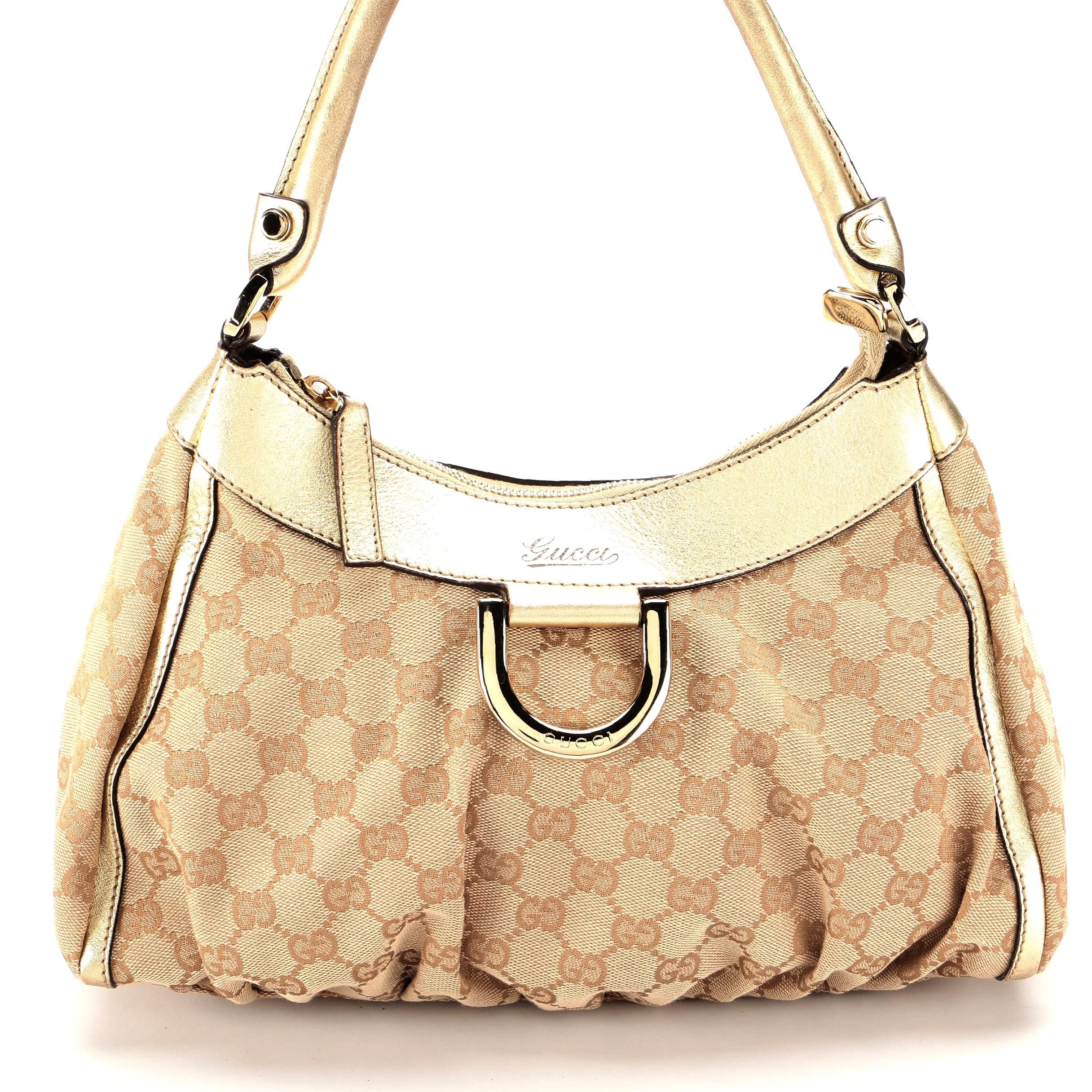 Gucci Abbey D-Ring Hobo Bag in GG Canvas and Gold Metallic Leather