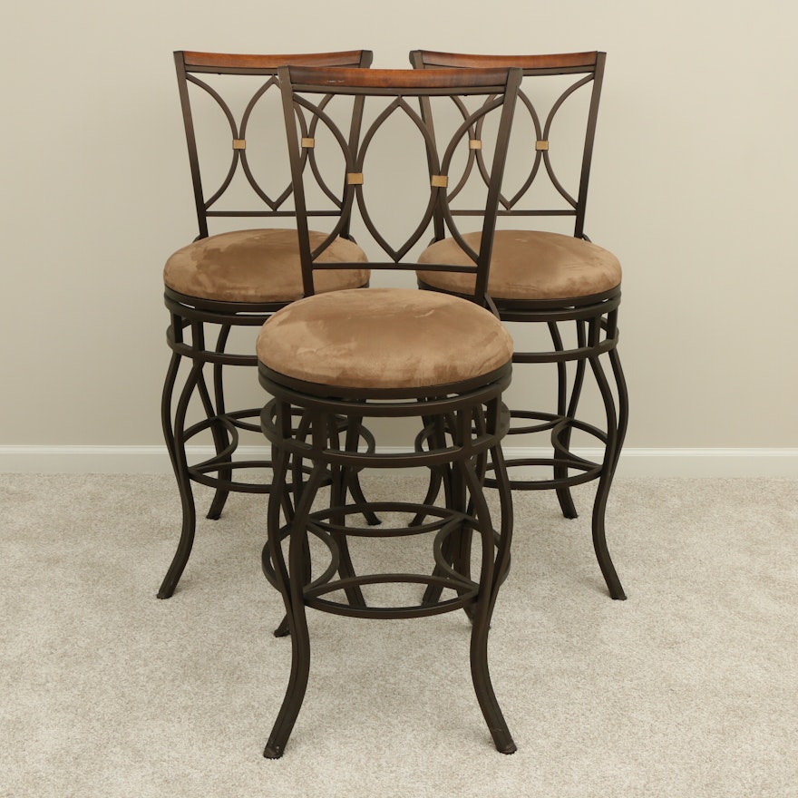 Three Camas y Muebles Iron and Wood Accented Swivel Seat Barstools