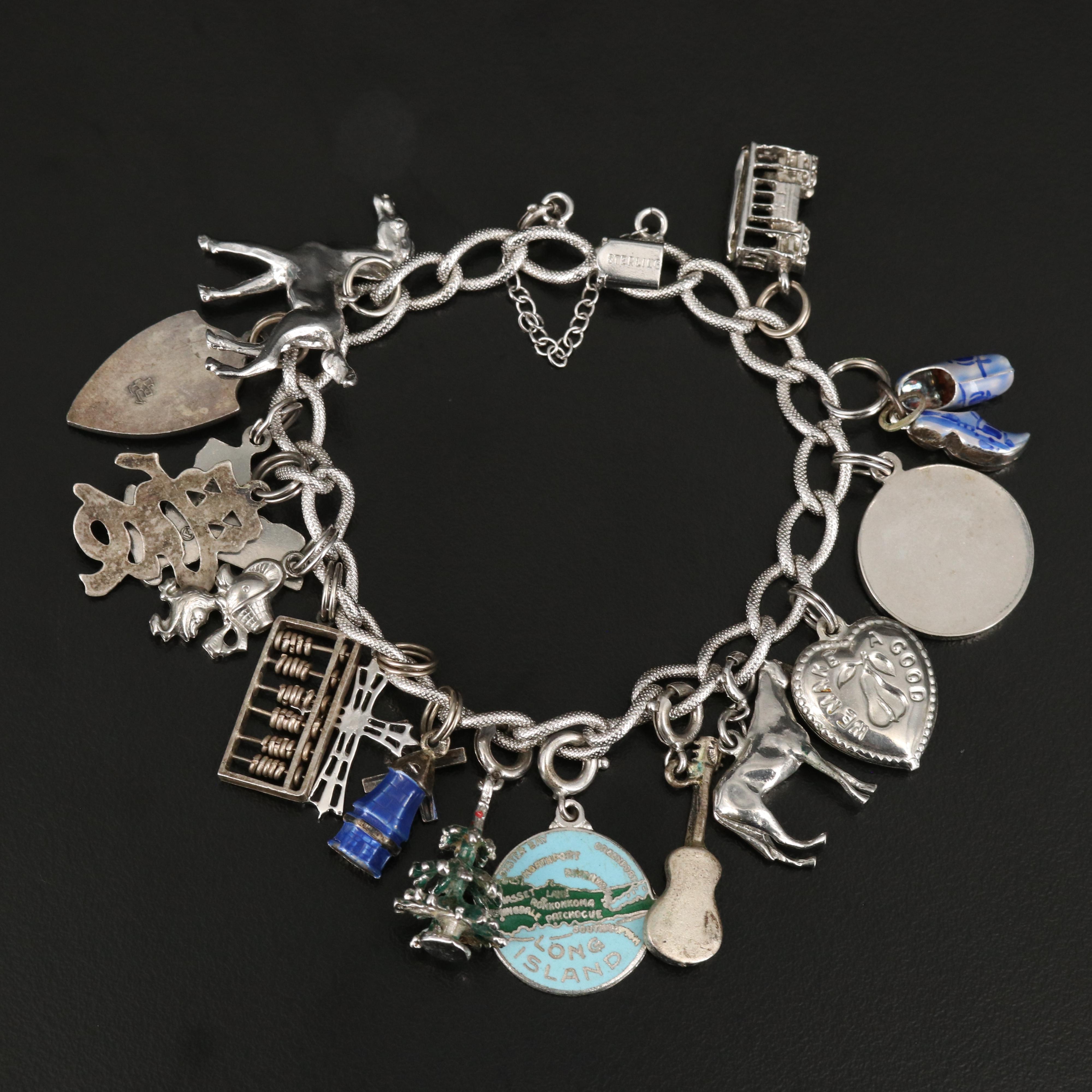 Sterling Charm Bracelet with Horse, Trolley and Abacus Charms