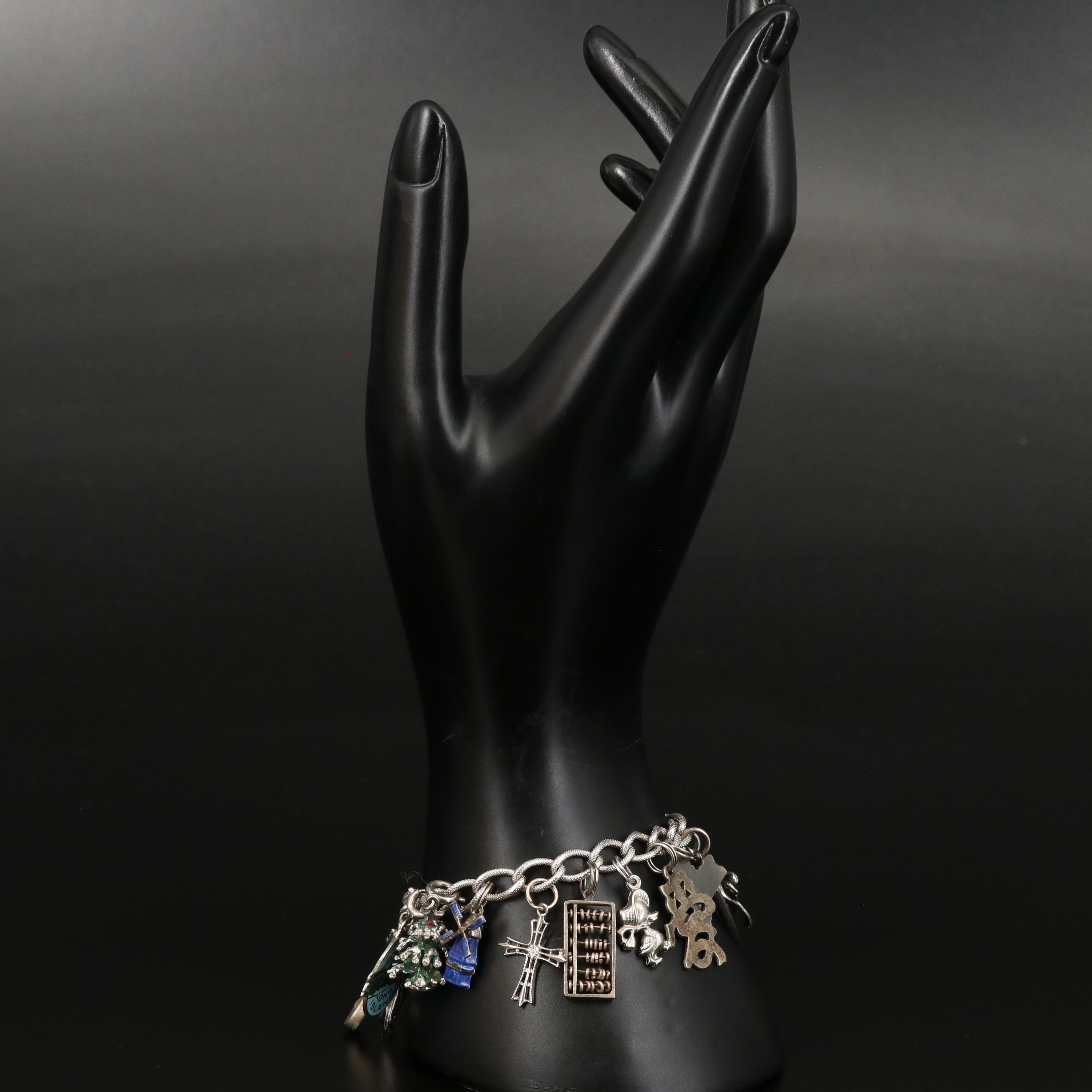 Sterling Charm Bracelet with Horse, Trolley and Abacus Charms