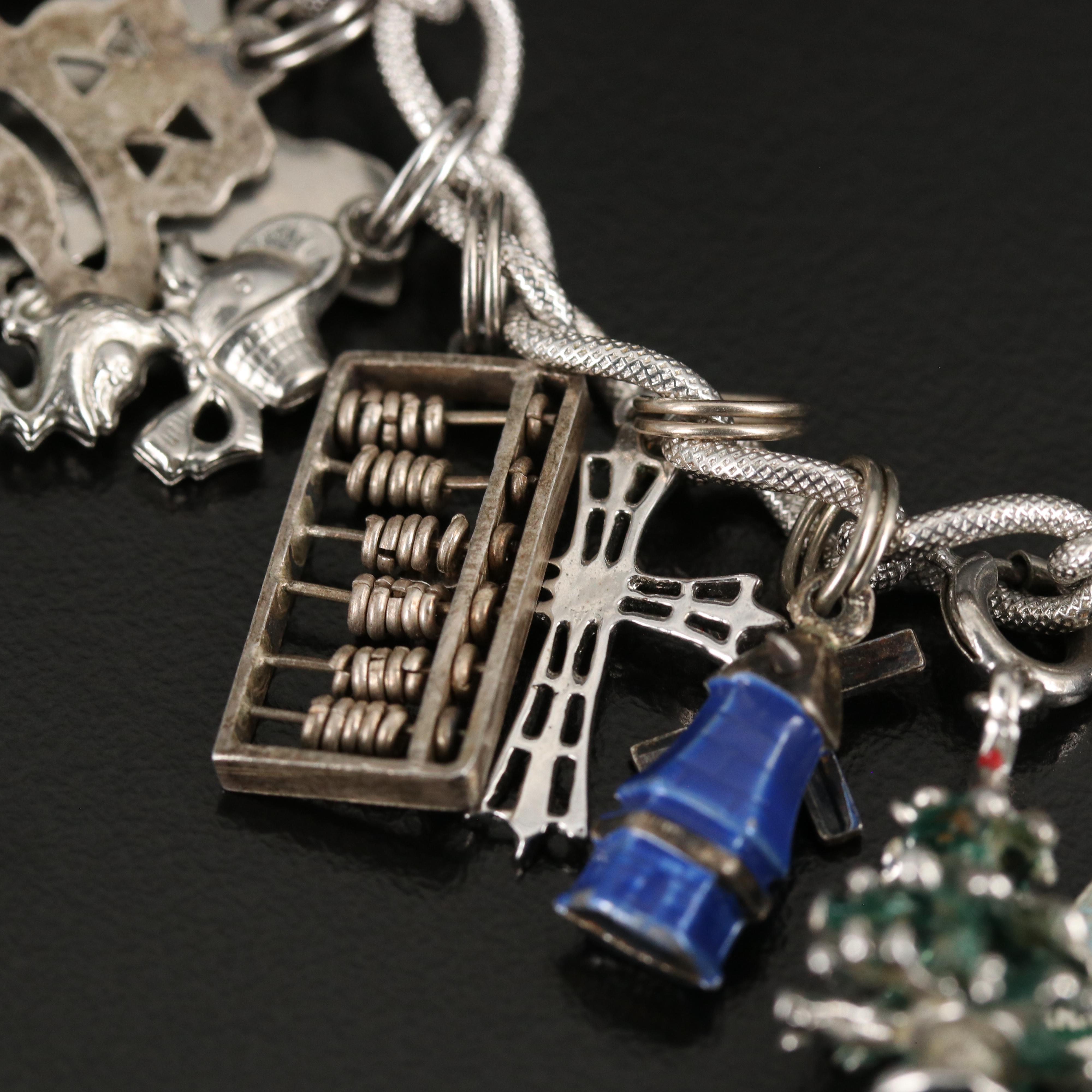 Sterling Charm Bracelet with Horse, Trolley and Abacus Charms