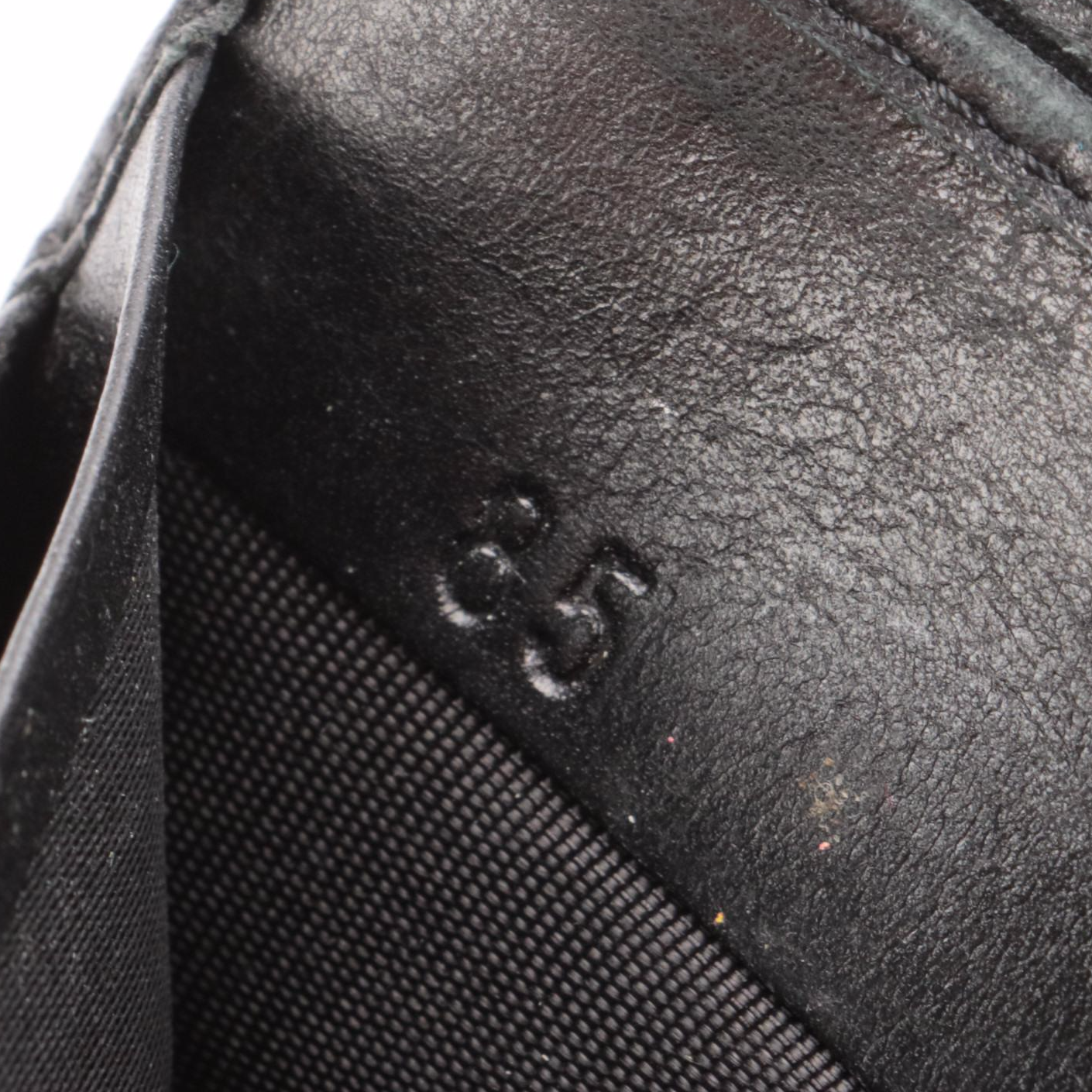 Prada Trifold Wallet in Black Lambskin Leather