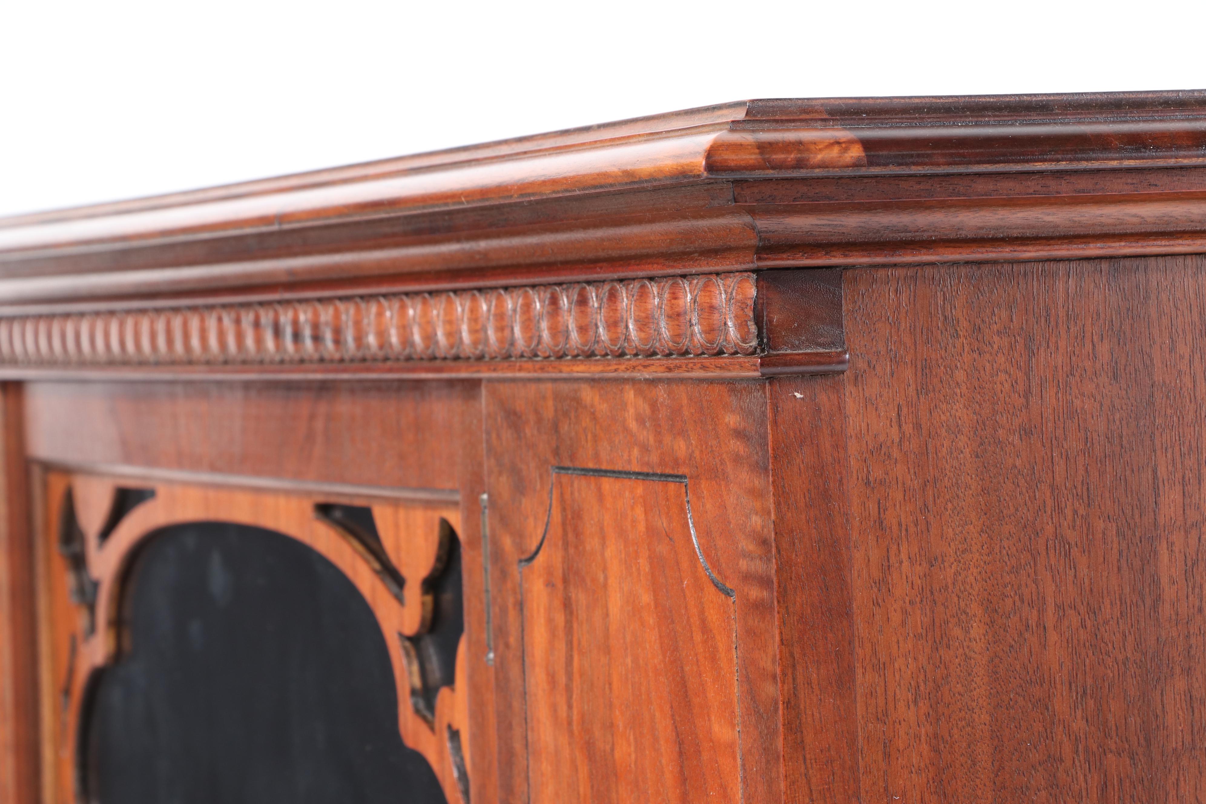 Rockford Furniture Co. Jacobean Style Walnut and Figured Walnut China Cabinet