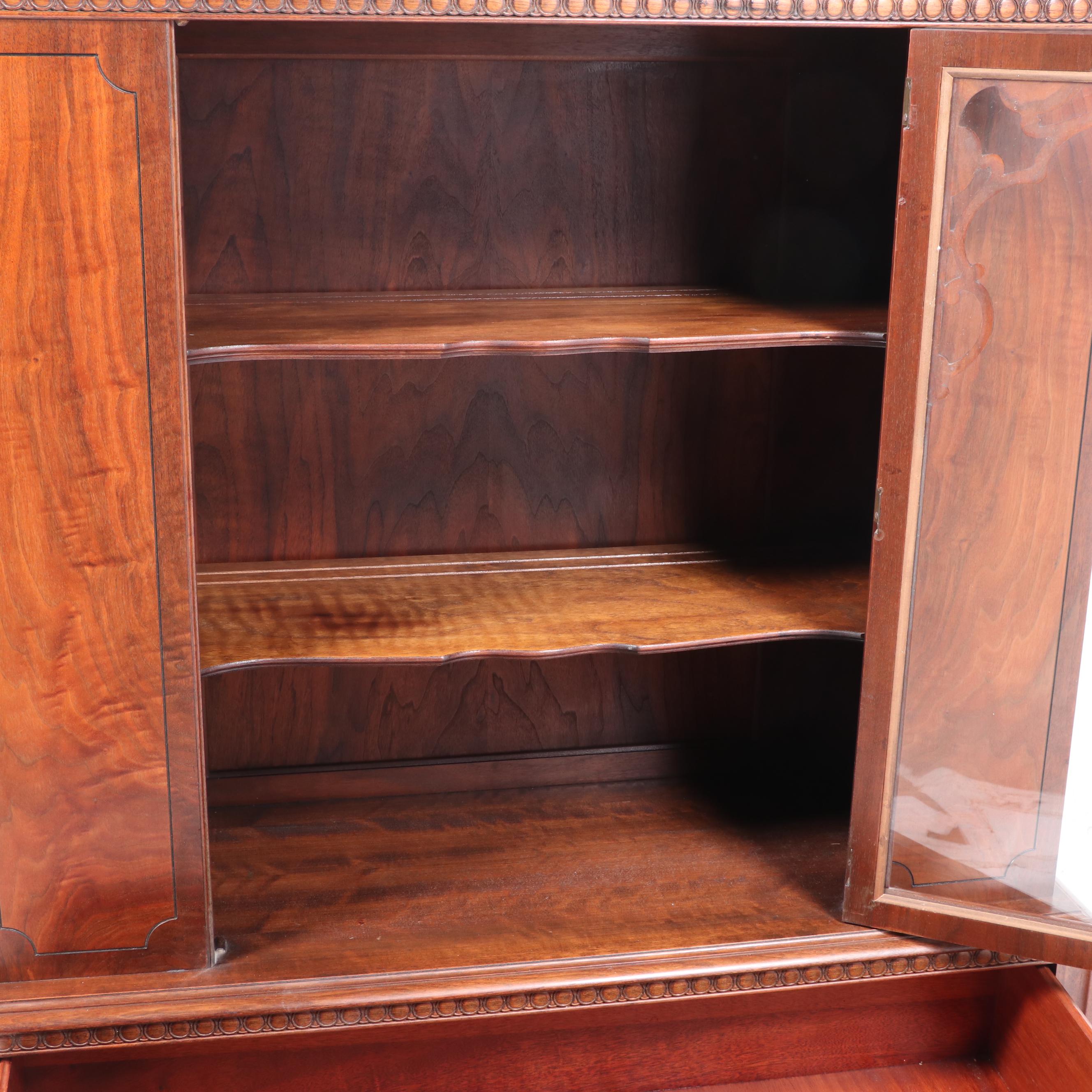 Rockford Furniture Co. Jacobean Style Walnut and Figured Walnut China Cabinet