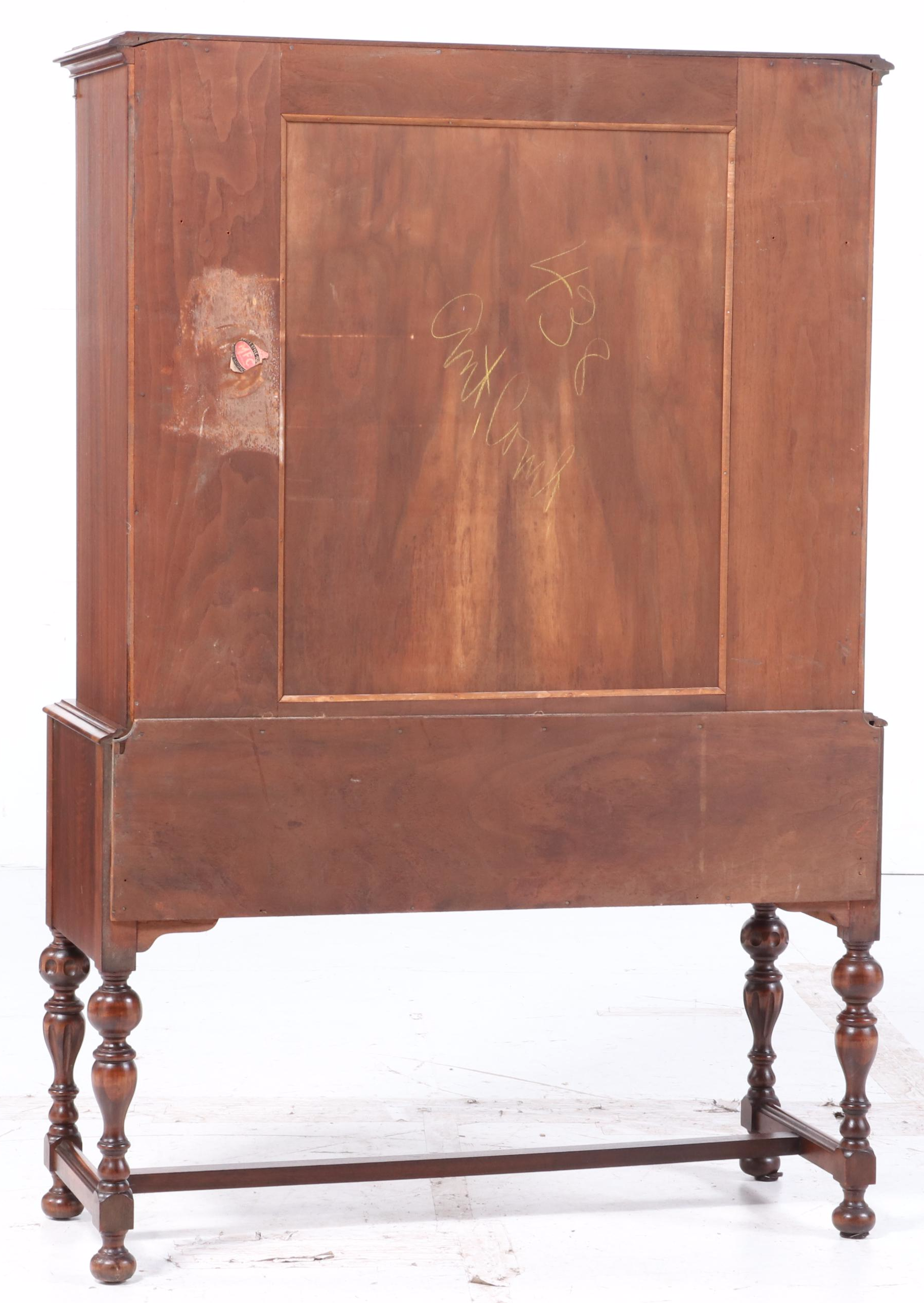Rockford Furniture Co. Jacobean Style Walnut and Figured Walnut China Cabinet