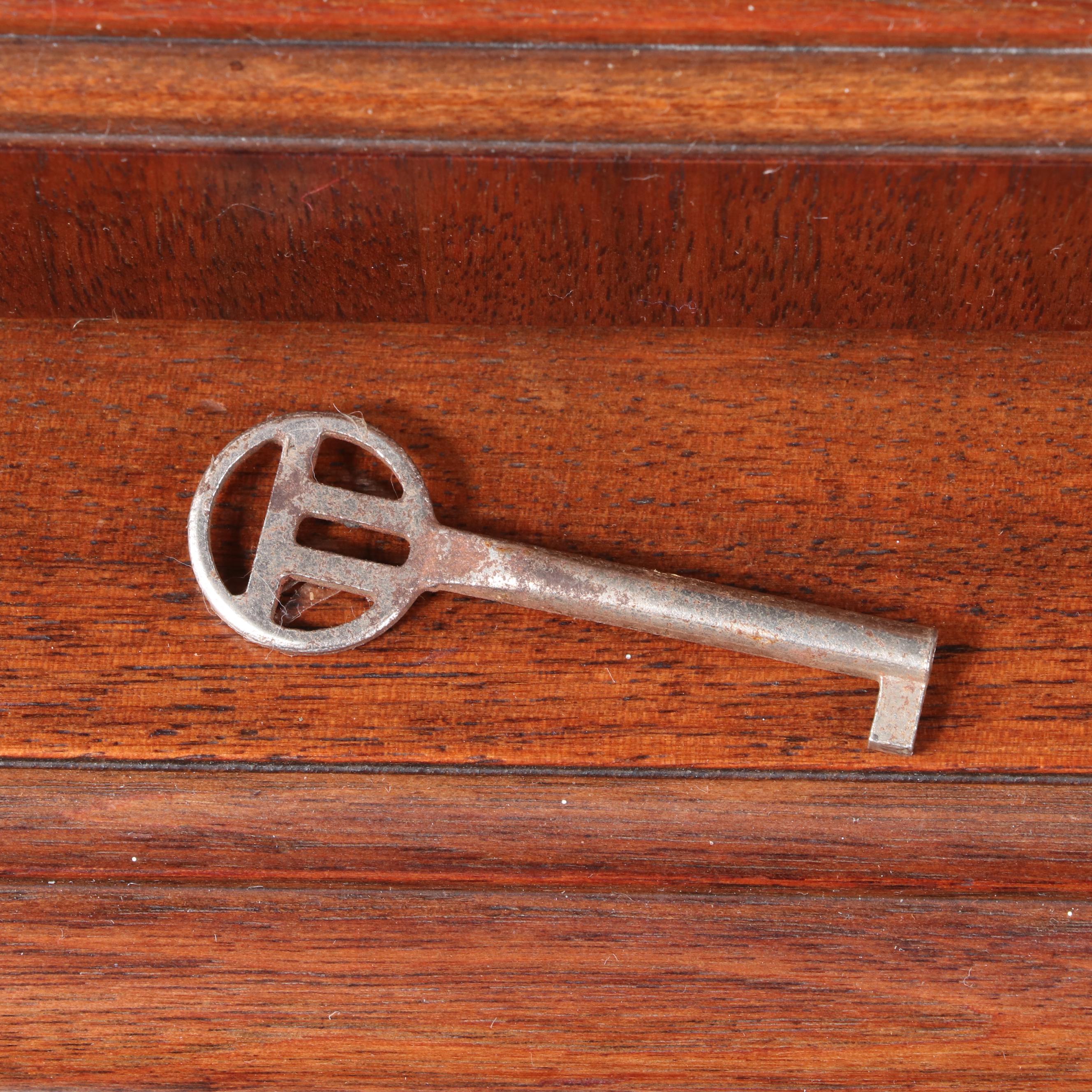 Rockford Furniture Co. Jacobean Style Walnut and Figured Walnut China Cabinet