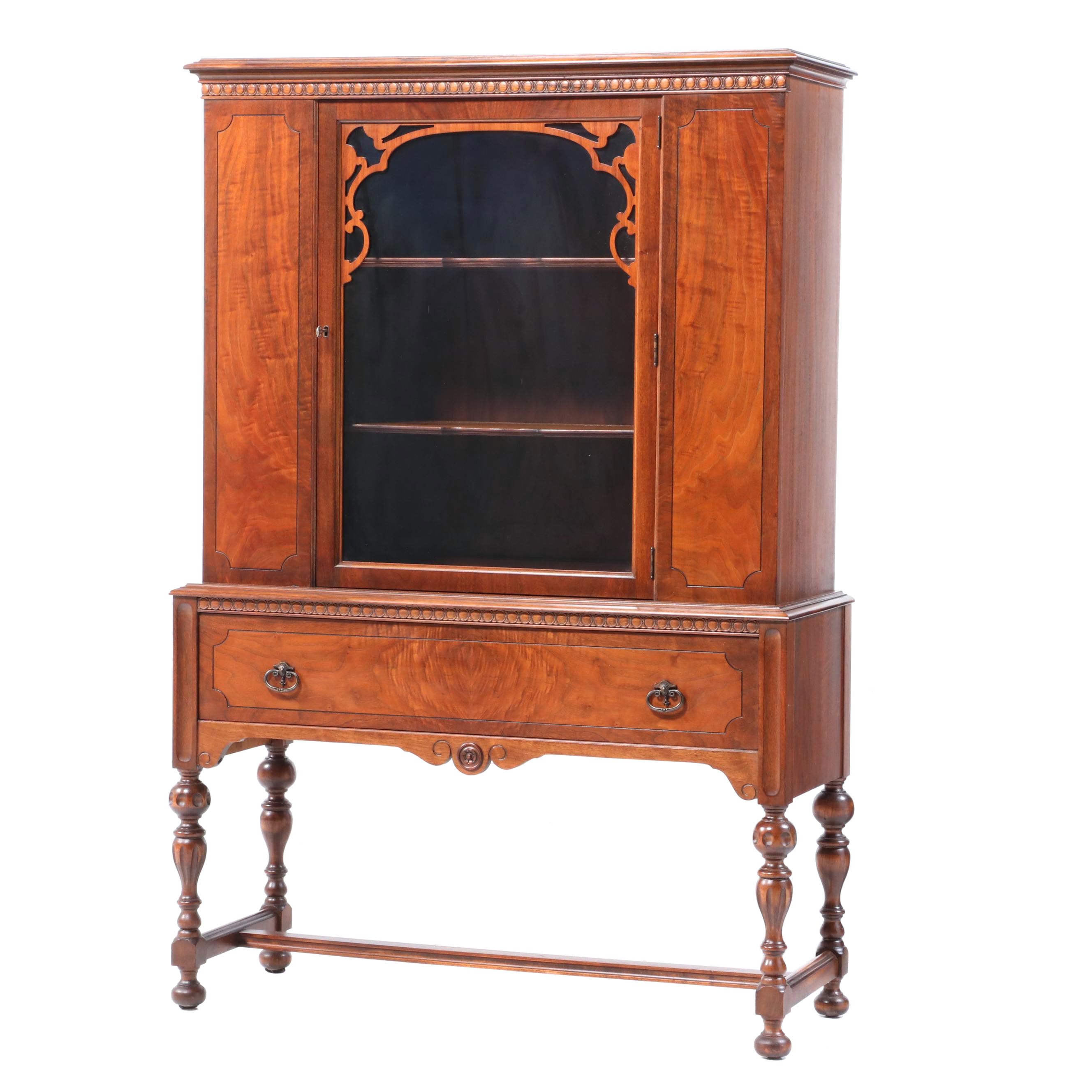 Rockford Furniture Co. Jacobean Style Walnut and Figured Walnut China Cabinet