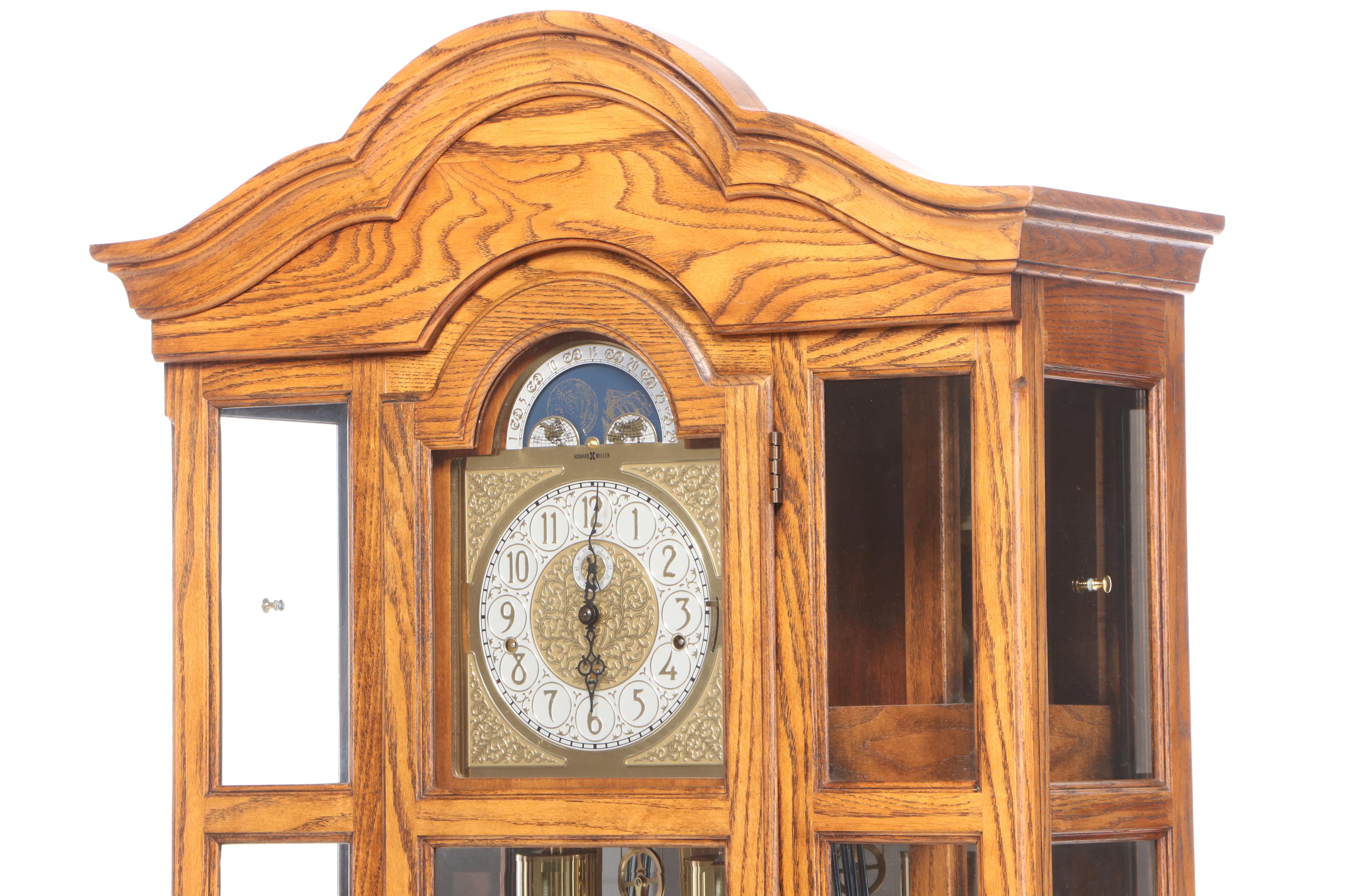 Howard Miller Oak Curio Grandfather Clock with Sidelights