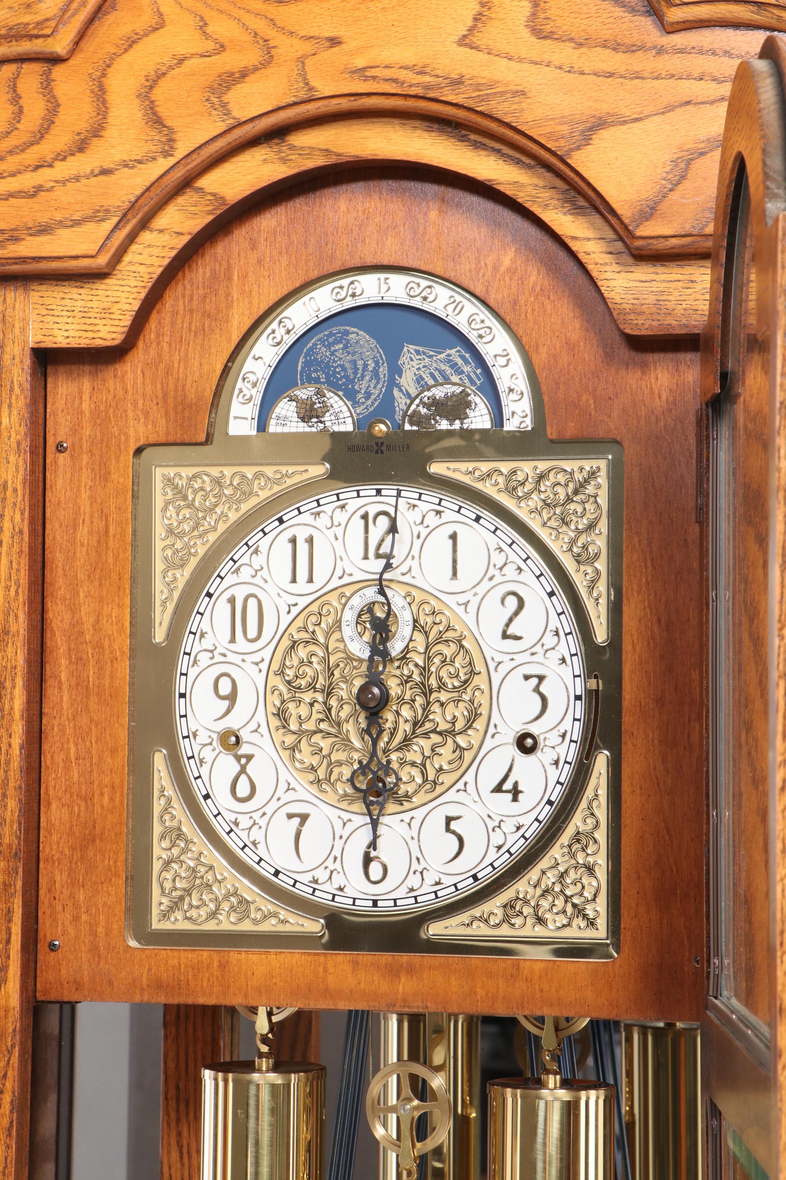 Howard Miller Oak Curio Grandfather Clock with Sidelights