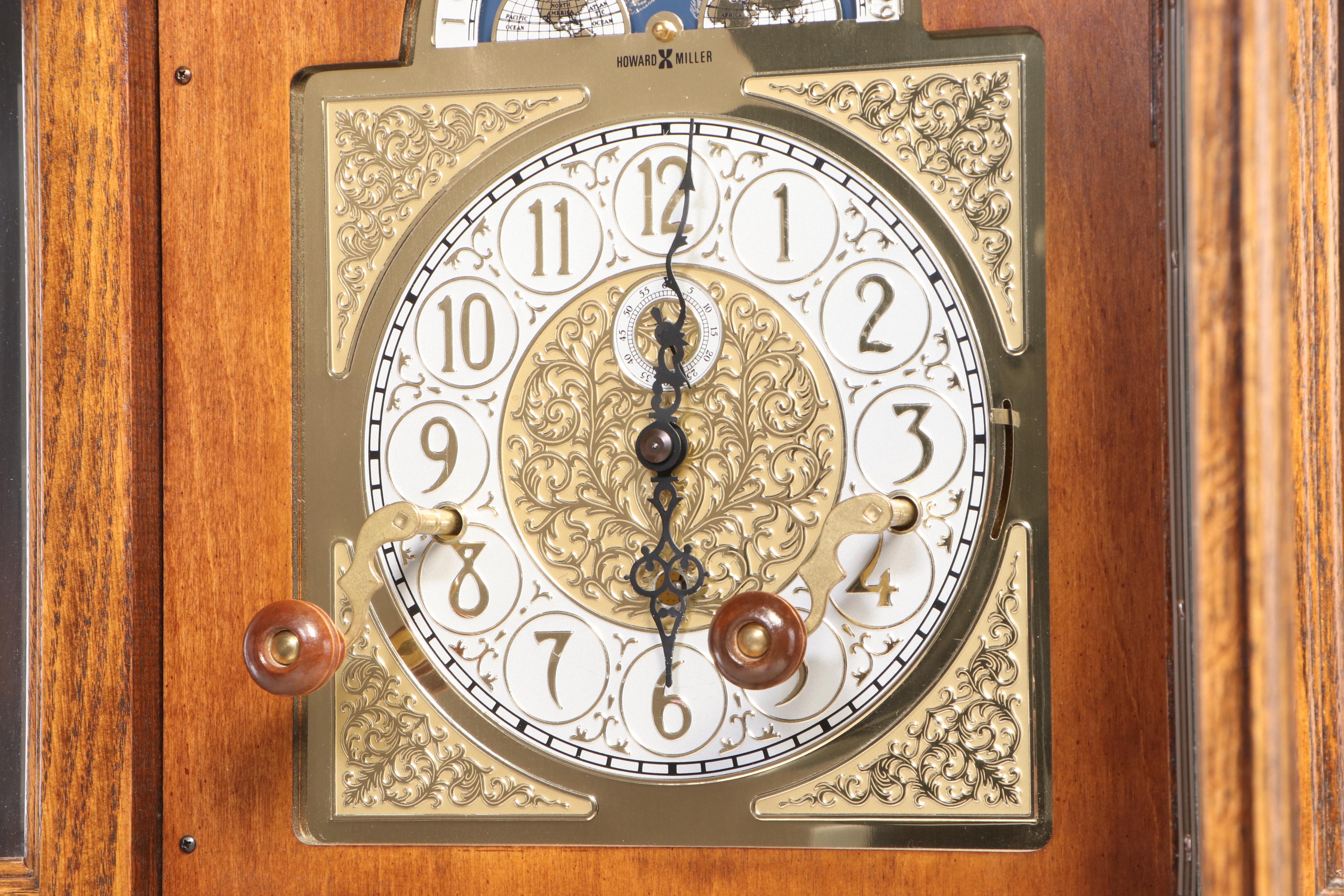 Howard Miller Oak Curio Grandfather Clock with Sidelights