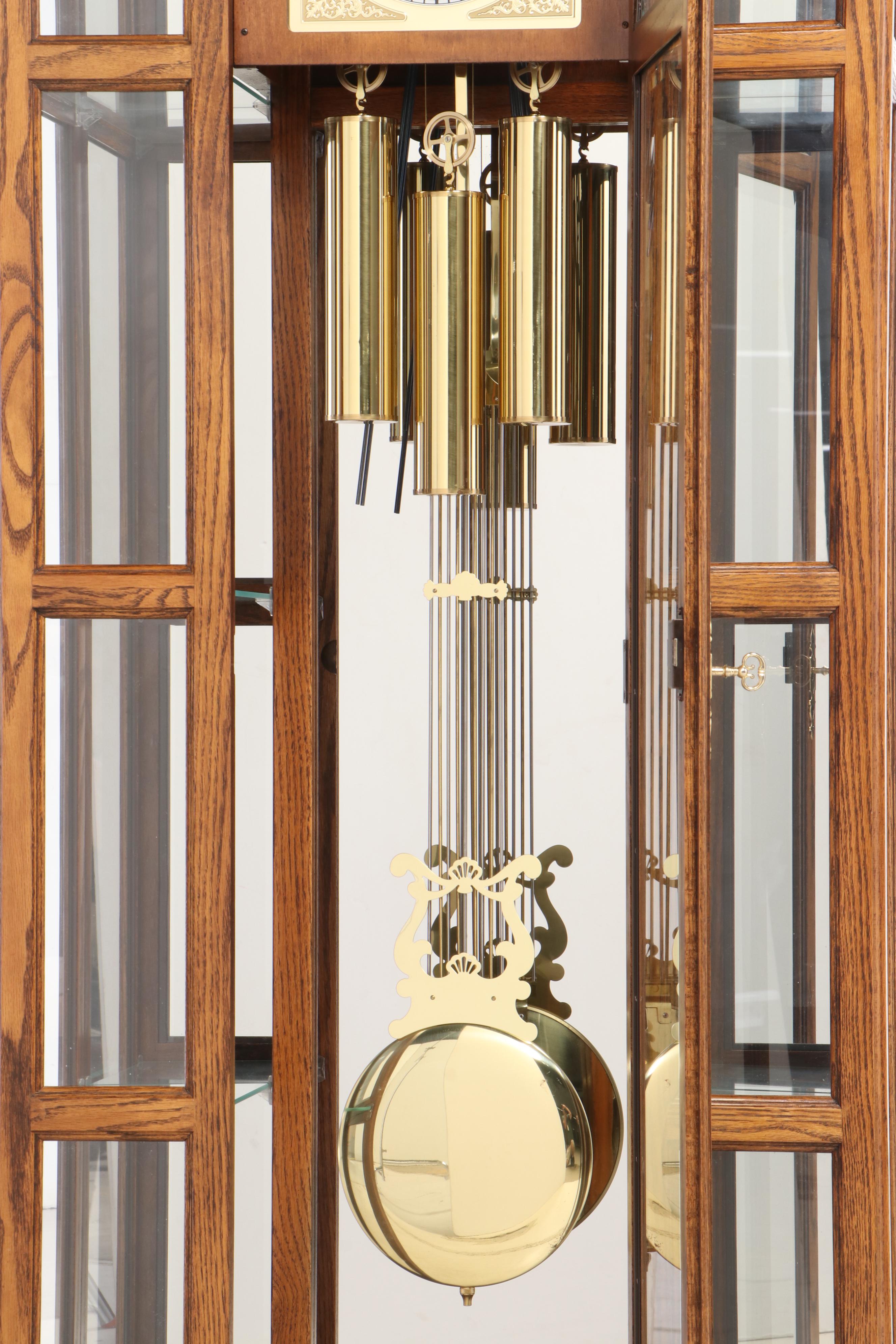 Howard Miller Oak Curio Grandfather Clock with Sidelights