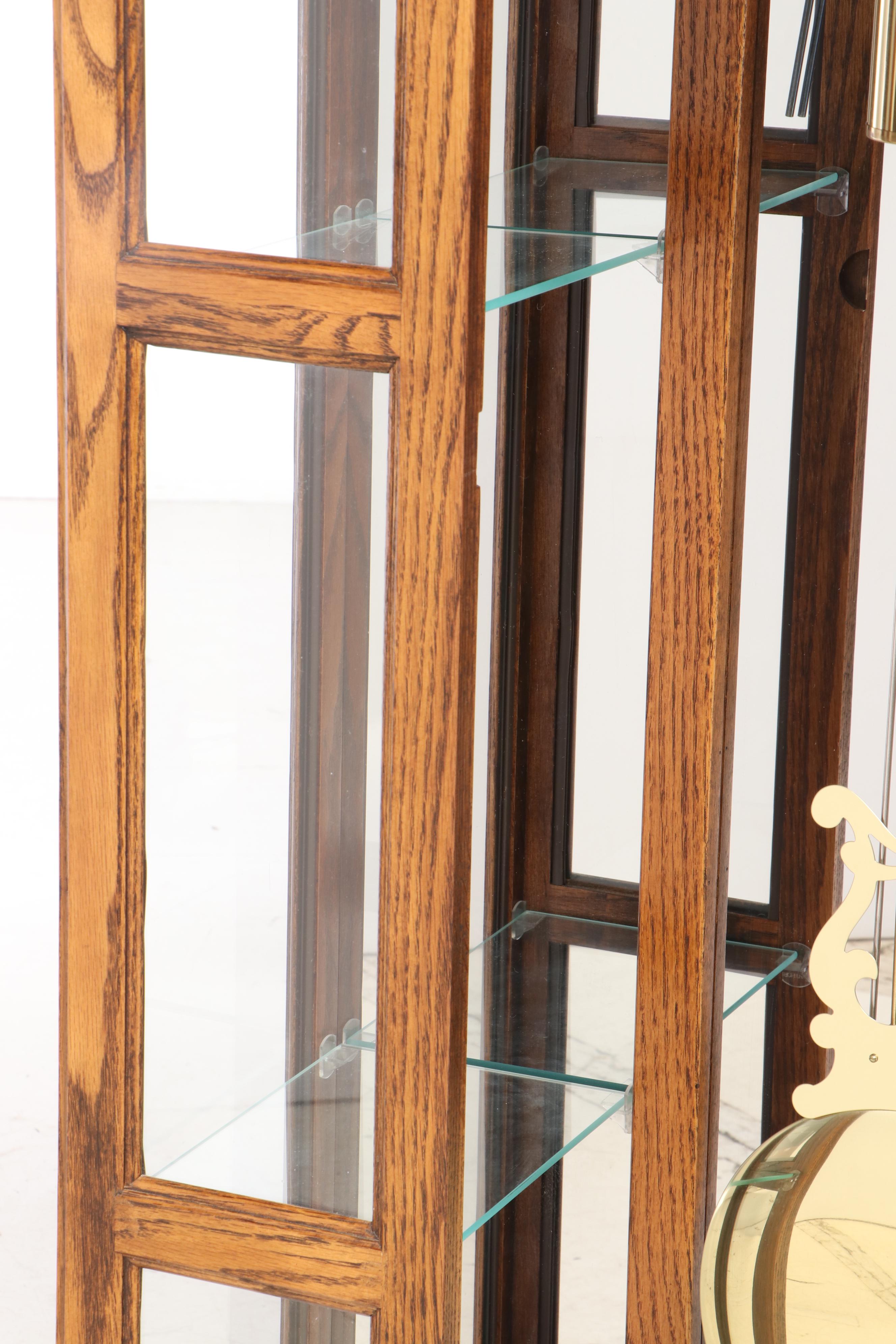 Howard Miller Oak Curio Grandfather Clock with Sidelights