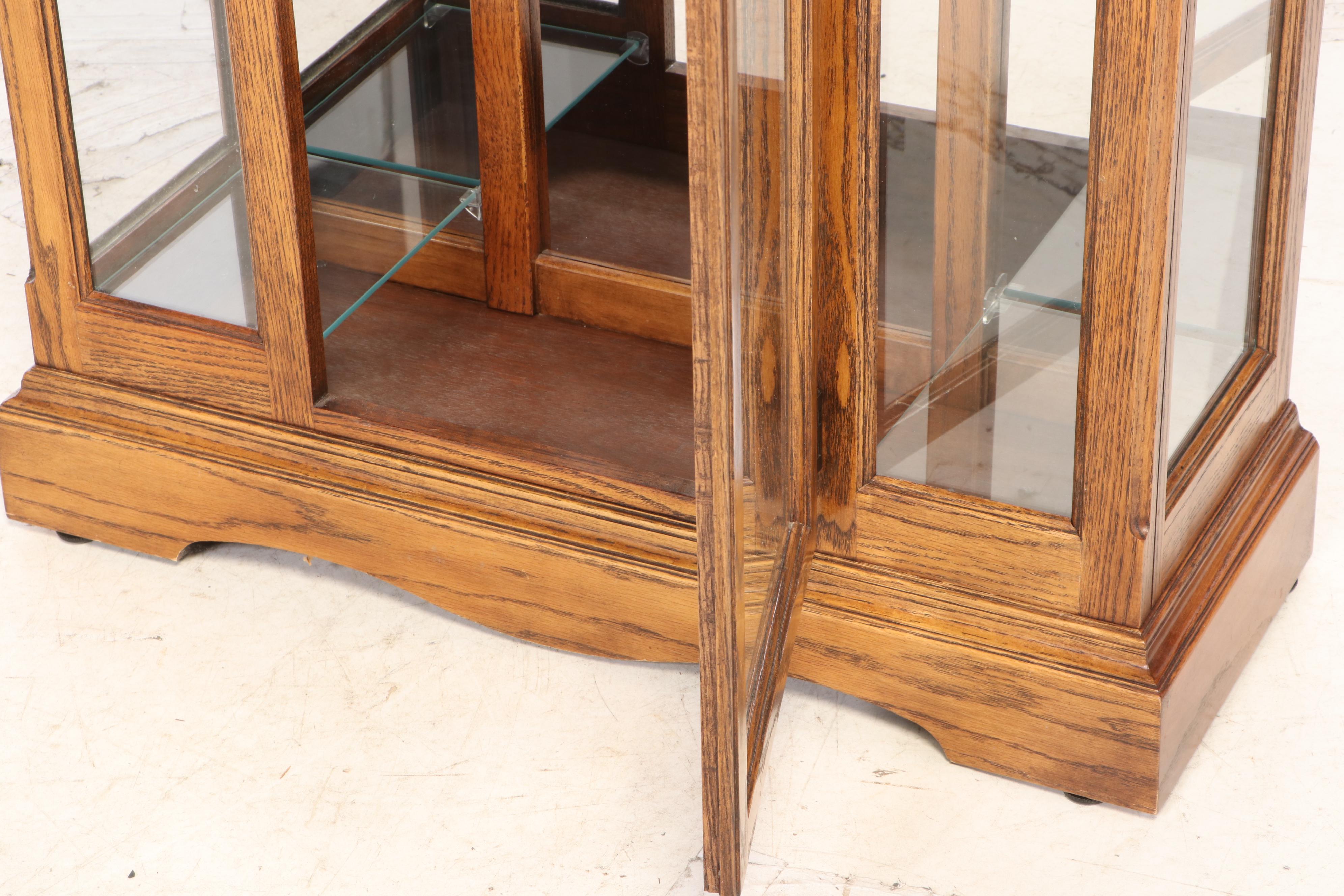 Howard Miller Oak Curio Grandfather Clock with Sidelights