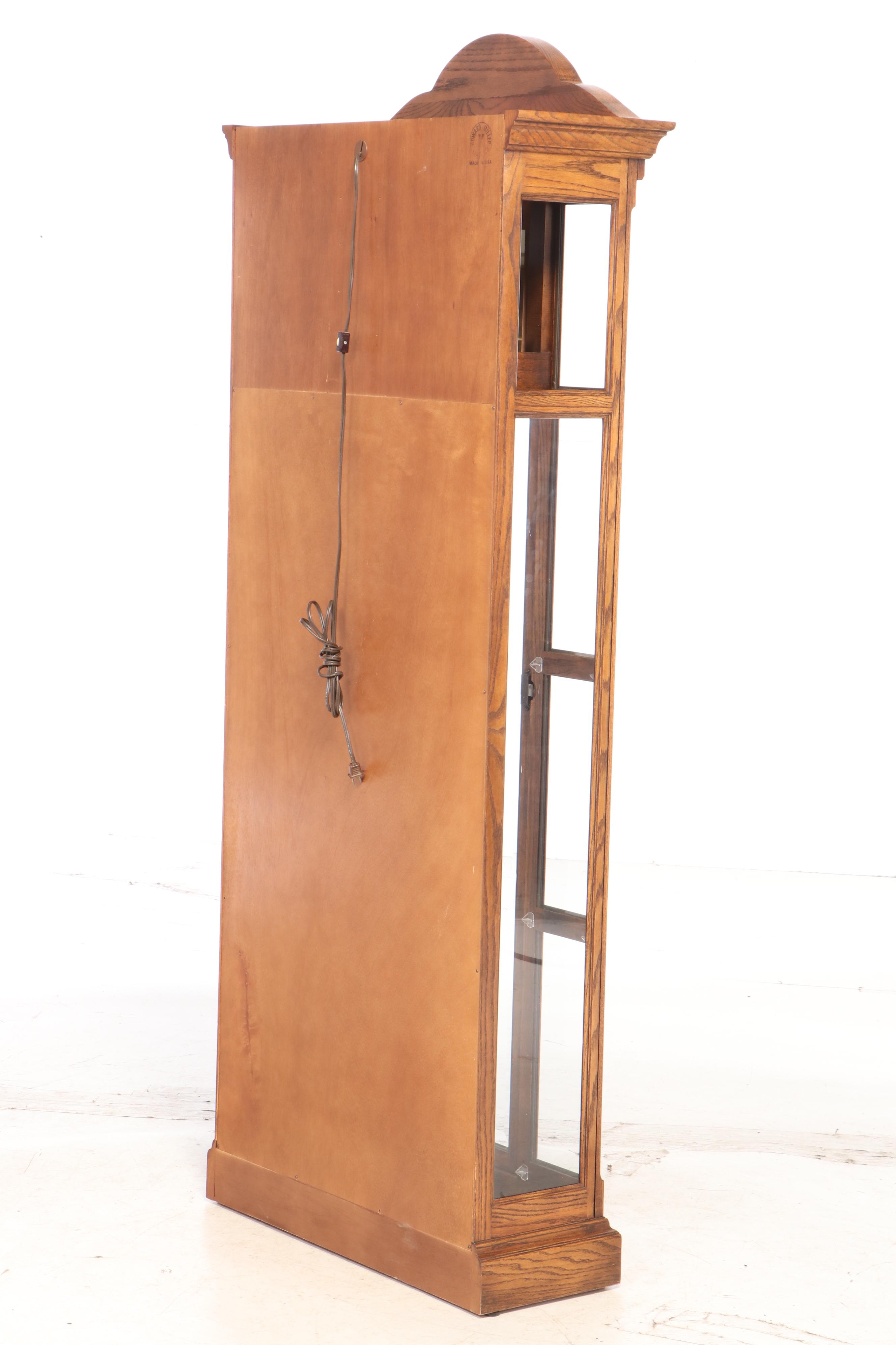 Howard Miller Oak Curio Grandfather Clock with Sidelights