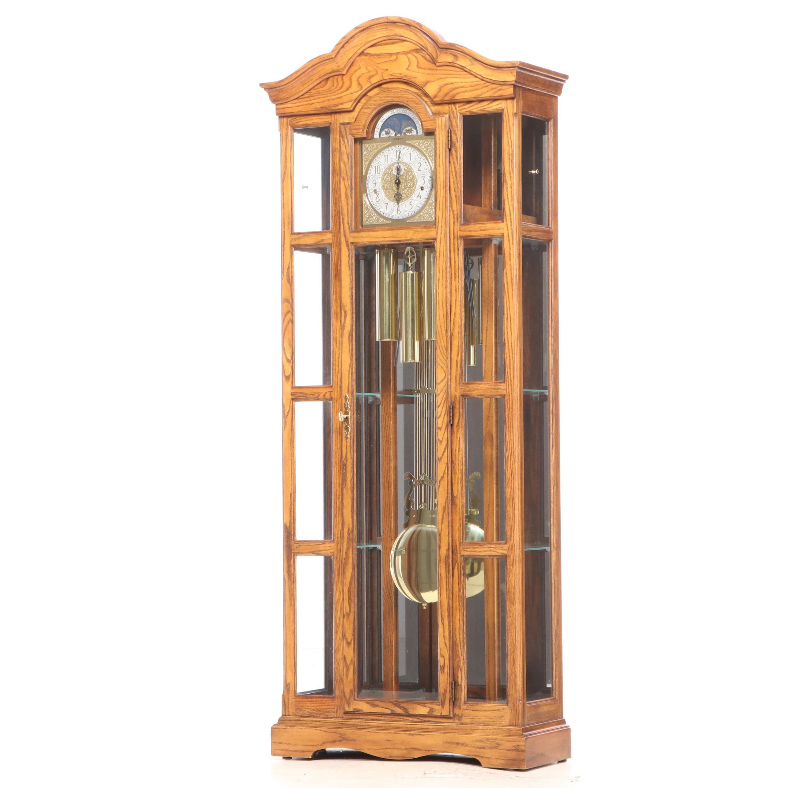Howard Miller Oak Curio Grandfather Clock with Sidelights